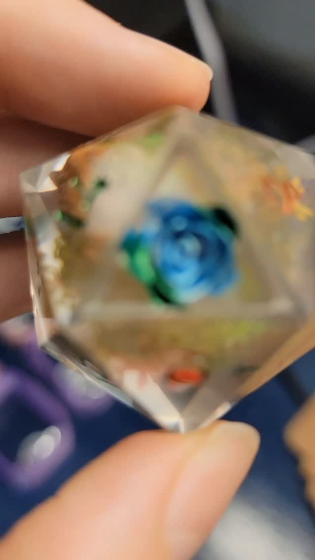 strawberry bunny in a rose d20 with the flowers n the buds! #dnd #d20 #flower #rose #bunny