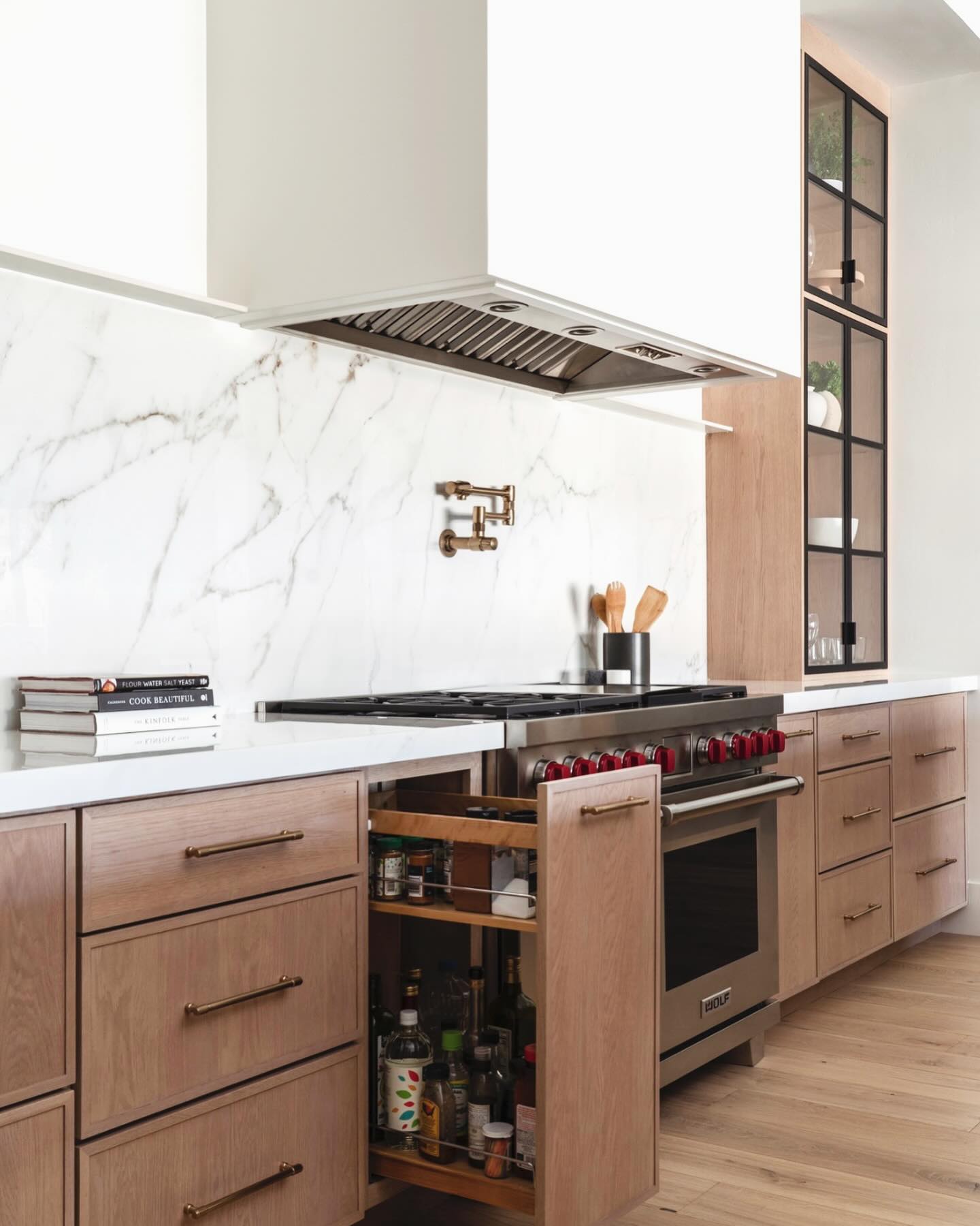 Almost every kitchen we do these days has this pullout. I even have it in my own home and love the easy access to large spices and oils!