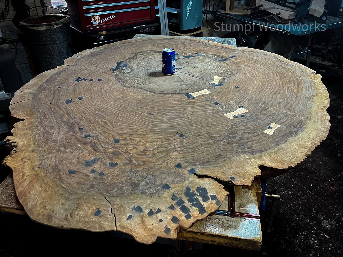 We have a rather large burly walnut round in the shop this month. It’s breathtaking in size and grain figure. I’ve already put some work on the surface, flattening, sanding and adding some colorful hickory bow tie joints. I can’t wait to show you the progress. The bud light is thrown in to show you the scale of this table. #stumpfwoodworks
#makegaragesdirtyagain