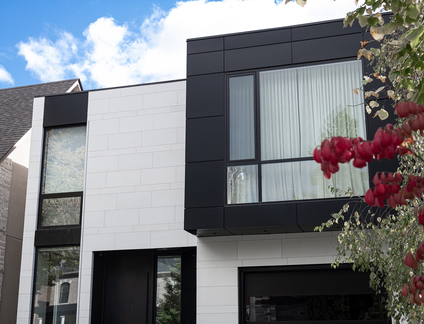 A modern home typically requires a combination of exterior materials to give a balanced feel. Check out our Lime-ROK panels paired beautifully with ACM. #customhomes #torontobuilders #oakvillebuilder #exteriorcladding