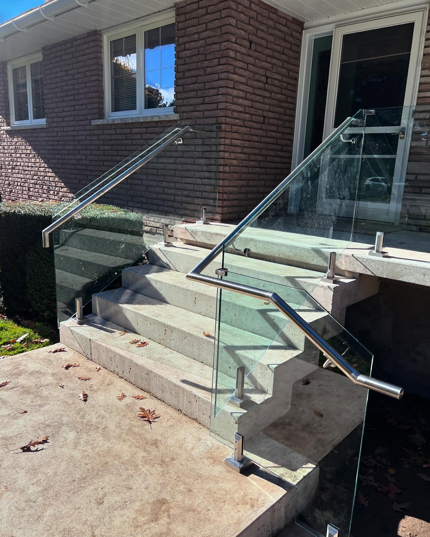 Clean stainless handrail, blended welds and brushed finish.