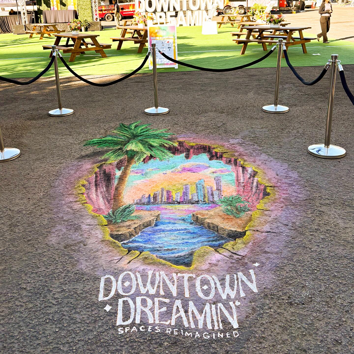 Y’all, check out this surface! The client warned that it would be challenging… It was dirty with over a half inch thick of dirt (swipe to see video of the leaf blower). Then 3 hours to tempera because there was still so much dirt that it mixed into the paint and wouldn’t stick... And lastly, that surface 👏 ate 👏 up my chalk. I do love a challenge! Hard to get a lot of detail on this kind of surface but I did my best. Pic of the distortion and of the surface up close if you swipe. Another 3d piece complete!
Thanks for having me, @downtownsandiego ❤️
#DowntownSanDiego #DowntownSanDiegoPartnership #FundraiserIdea #3dChalkArt #SanDiegoChalkArtist #ChalkArtist