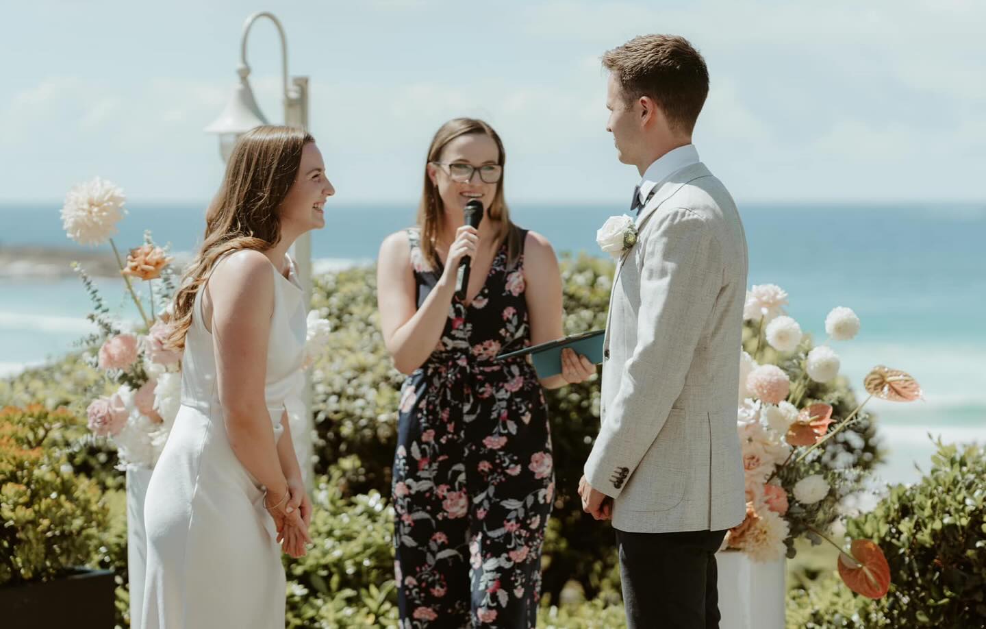 Do I take part in weddings? Yes! Do I post about them? Not really. 😅 In fact, I’m currently in the process of a little website refresh and realised I haven’t shared these cuties yet – and they definitely deserve a permanent spot on my feed (as do many others and I’ll get there, eventually 🙈)
I had the absolute pleasure of marrying Tahlia and Josh a while back (over a year and a half ago now!) Loved making these adventurous spirits Mr. and Mrs. on this stunning day at @piluweddings in Freshwater.
Here’s what they had to say about my services:
“Beck was amazing! Really appreciated the completely personalised ceremony. She listened to all our requests and was so easy to communicate with. Beck helped us out with looking over our vows and made the whole process so easy. We are so pleased she was part of our day. Highly recommend! Thanks Beck xx”
Photography: @amberwynnjones
Flowers: @whitehouseflowers
Music: @adrianjosephmusic