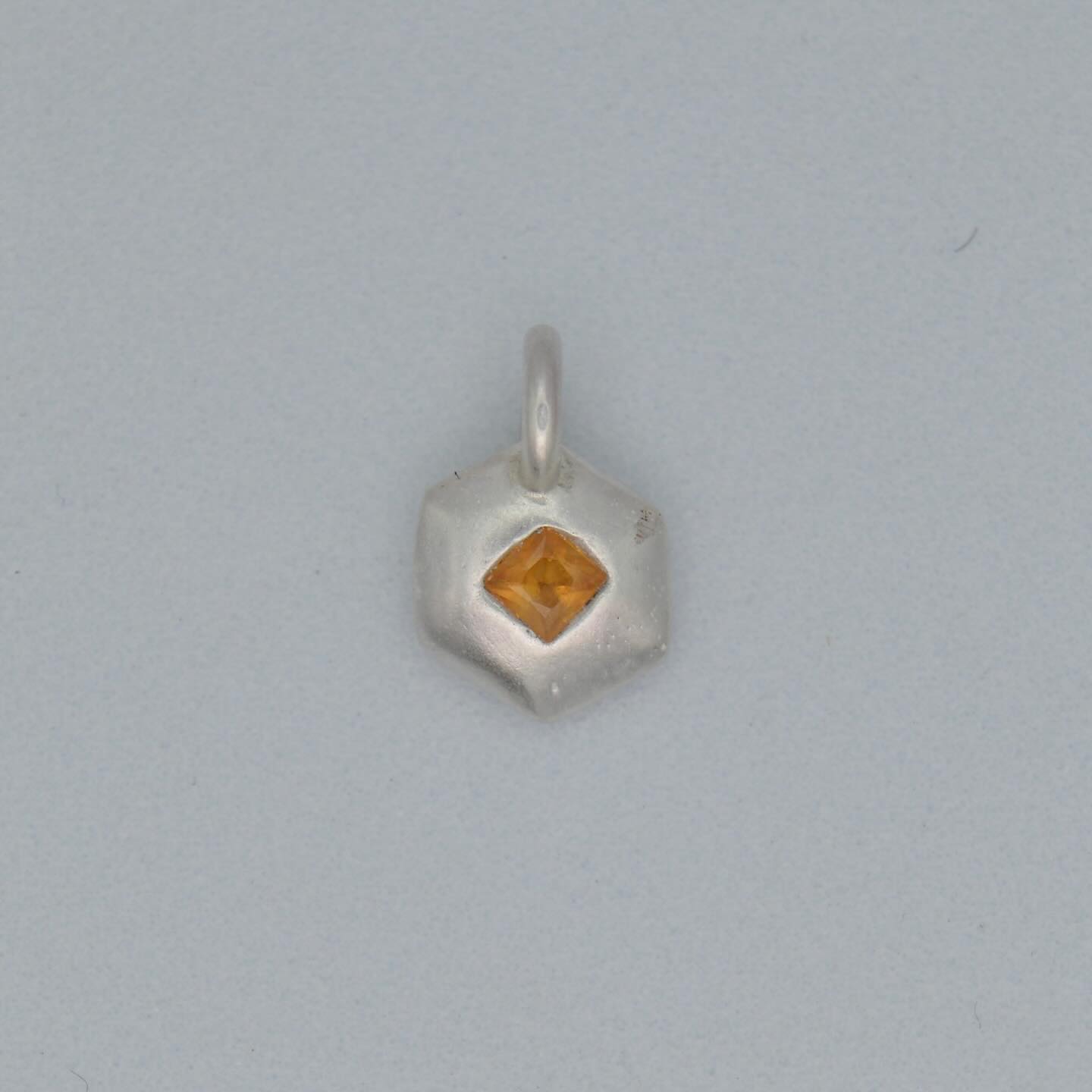 New sandcast pendants are available at annekemagarianjewelry.com now! #giftideas #jewelry #sterlingsilver #protectioncharm #sapphirejewelry