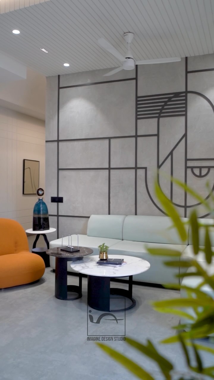 This corporate office designed for @ganitstarengineering located at Sinhasa, Indore is spread over an area of 4000 square.ft. ..
.
.
The facade follows a minimalist theme, with lighting being the primary design element. The carefully planned lighting not only enhances the building’s visual appeal but also highlights the core function of the office — a place dedicated to innovation and design in the lighting industry.
.
.
The interior showcases a composition of clean, straight lines paired with a white-wash effect on the walls, creating an open, airy environment that fosters focus and productivity. Its design reflects a modern, minimalistic aesthetic, skillfully blending elements of rustic finishes with sleek glass accents. The use of rustic materials adds warmth and texture, balancing the cool, contemporary feel of the space.
.
.
A standout feature of the office is the artwork, which thoughtfully integrates the company’s supply chain network across India. These pieces not only showcase the scale and reach of the business but also celebrate Indian culture through vibrant, artistic representations.
.
.
Designed @imagine_design_studios @architect.ankitmittal
@id.parakhgupta
For @amitgoyal4367 @gunjeet17vinny @badjatyanimit
.
.
Captured by - @imagix_studi0
.
#interiordesign #indorearchitects #architecture #interiorstyling #interiordesigner #luxuryinteriors #corporatelife #corporatedesign #corporateoffice #corporateofficedesign #corporateofficeinteriors #corporateofficespace #officedesign #officeinteriors #officeinteriordesign #instadaily #trendingreels #explorepage✨