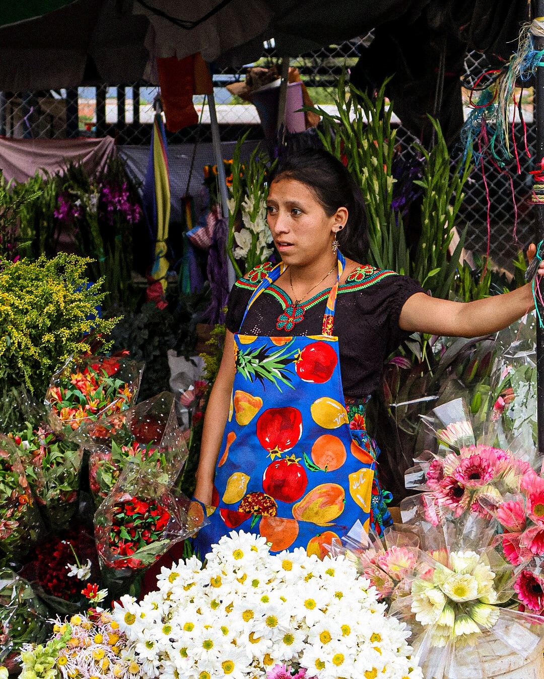 Scenes from the bustling central market in Antigua and the vibrant town of Sumpango.
In Sumpango,Día de los Muertos, is a cherished annual tradition for the Mayan people. Every November 1st, families come together to honor their departed loved ones by adorning graves with colorful flowers. The cemetery in Sumpango become a vivid celebration of remembrance and connection.
#womenphotographers #womenwhotraveltheworld #guatemala #sumpango #blackwomenphotographers #digitalphotography #vsco