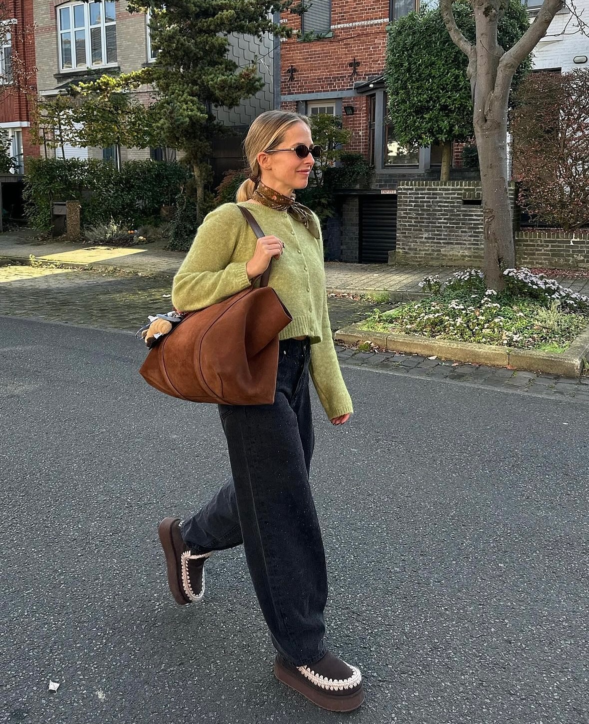 Stepping into style with @eloiselecluyse, effortlessly rocking her Mou shoes 🤎✨ @moufootwear #shoeslover #cozychic #fallfashion