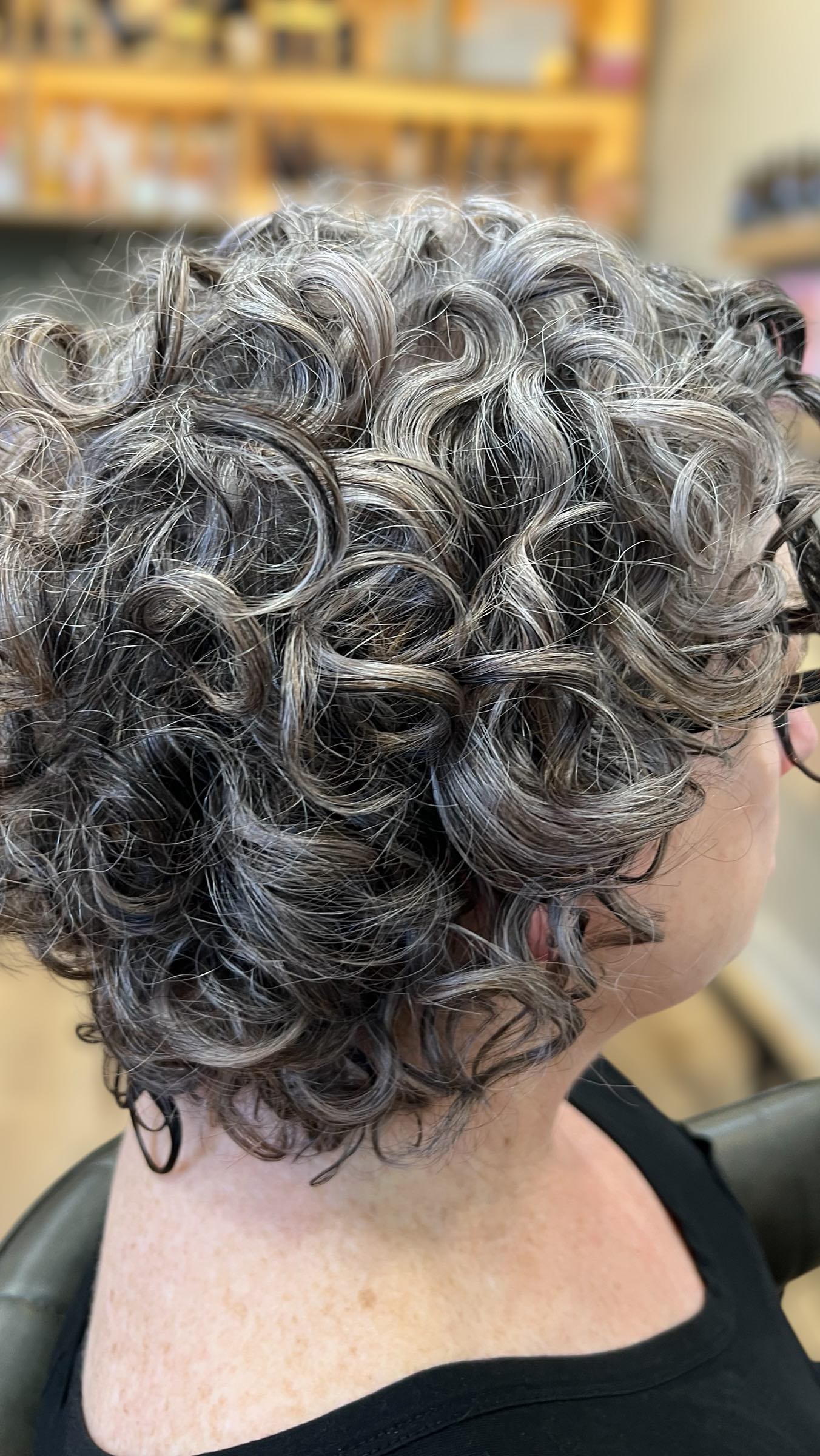 This was a stunning colour transition that I thoroughly enjoyed creating for my guest. Her curls appeared softer and fuller, showcasing a beautifully natural blend of silver and white that beautifully mimicked her natural colour pattern.
Service time 7 hours.