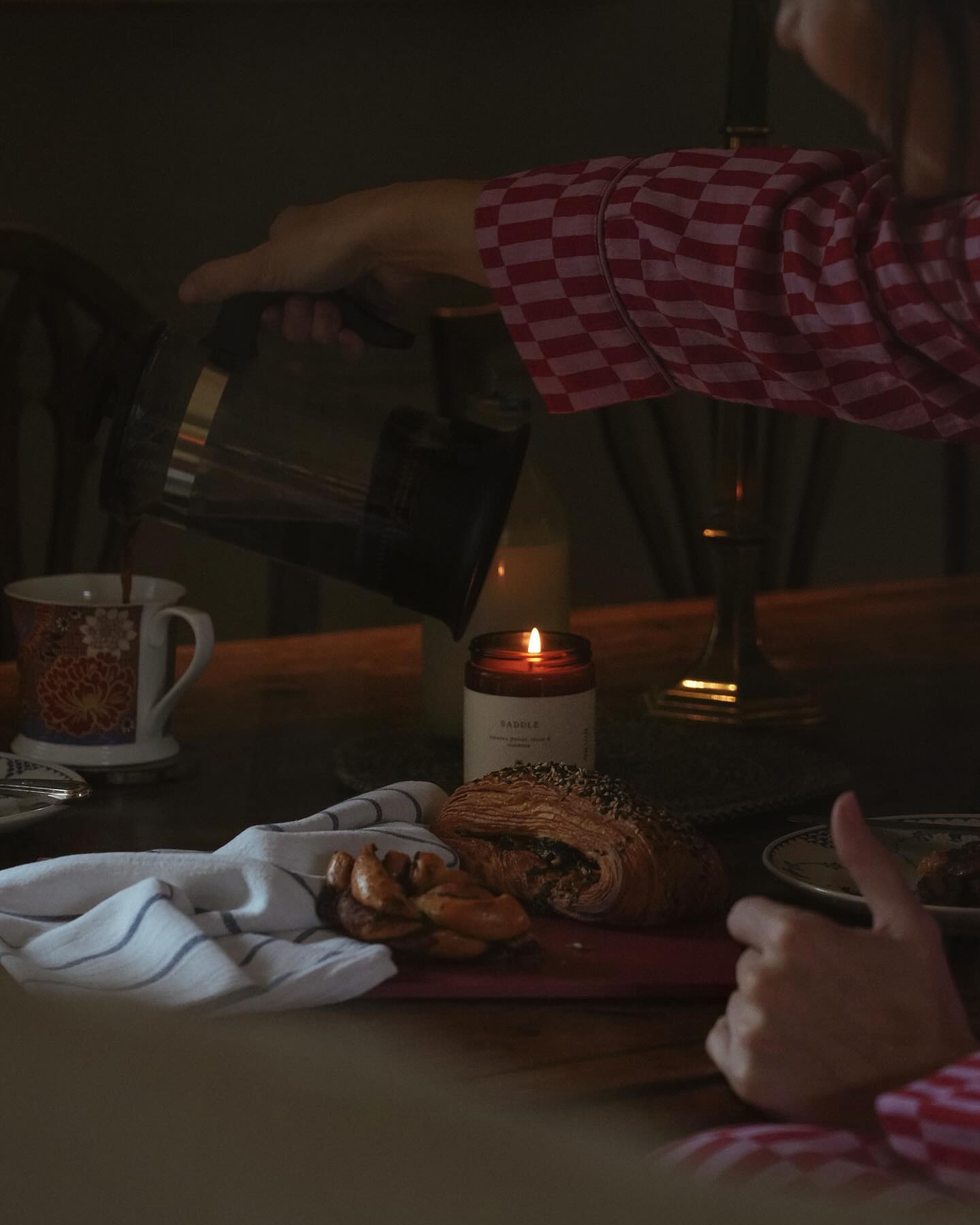 Dark mornings invite the warmth of a candlelit breakfast