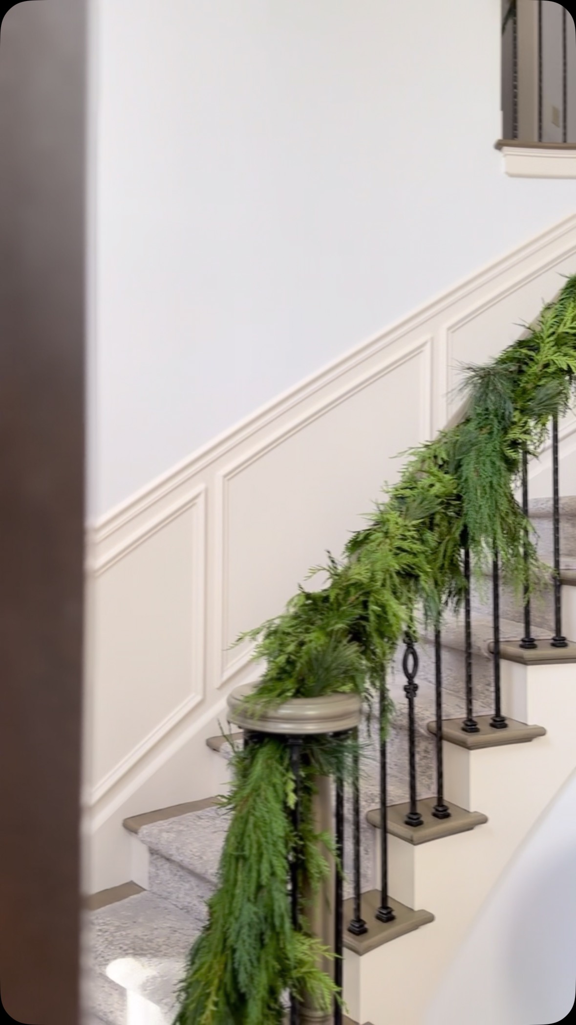 Our bride and groom are off to warmer days on their island honeymoon but we knew they would enjoy the fresh cedar garlands from their wedding day when they return. So with help from a little elf, we went to their house and decorated their stairs for a truly inviting homecoming! The fragrance is intoxicating,evoking all the warm fuzzies of coming home for the holidays. #freshcedar #garland #grandstaircase #homefortheholidays #homeforchristmas #winterwedding #repurpose #evergreen