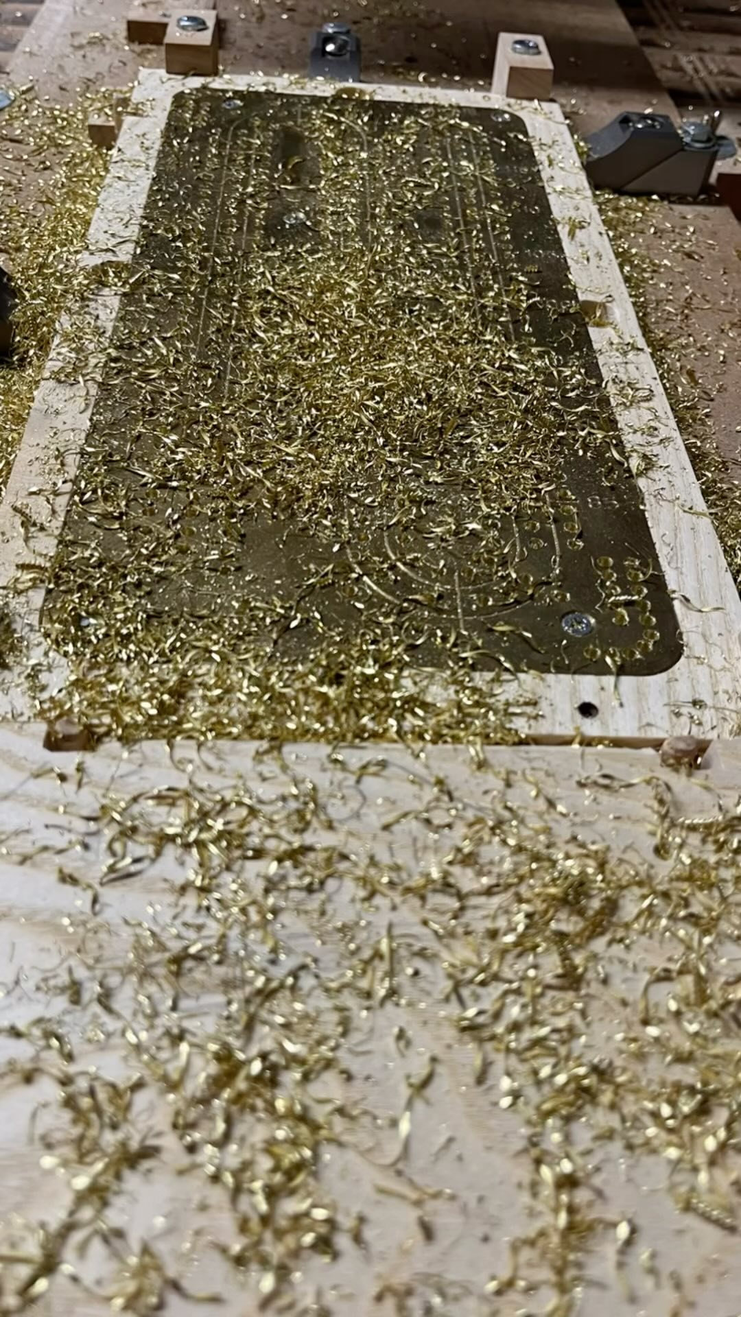 Today, we are drilling brass plates for wooden cribbage boards. Never a dull moment around here. Let’s make some glitter!! #glitter #christmasglitter #woodworking #customcnc projects #customcnc #custommadegifts