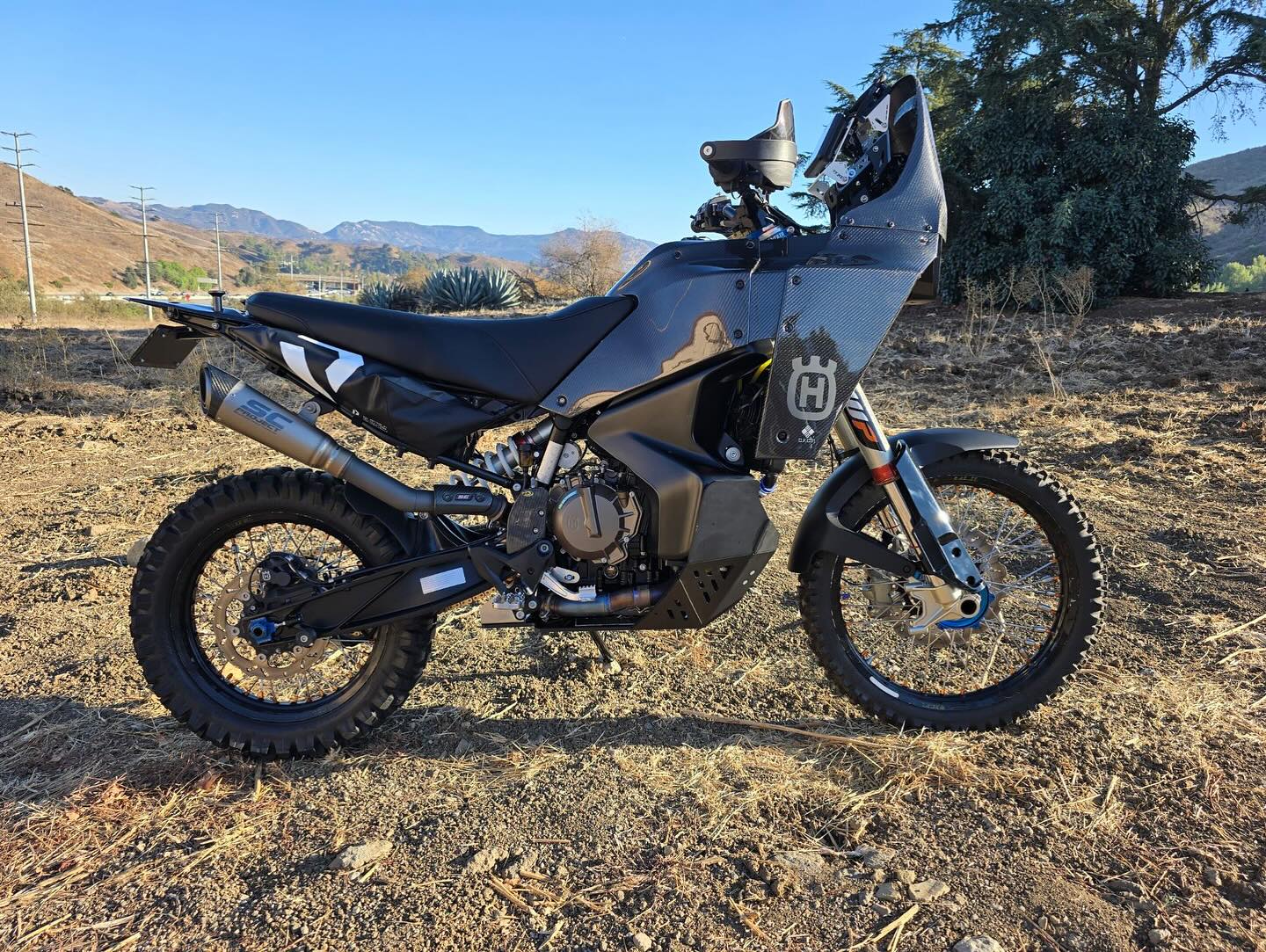 Cats out of the bag thanks to @rottweilerperformance 😅😂
This @husqvarnamotorcyclesusa #Norden901 is absolutely ONE OF A KIND
This new @aurora.rally Kit with Full Custom Carbon Fiber Fairing is something of beauty and function!
Titanium hardware throughout
-Ti Headers, Custom Mid Pipe & SC Muffler
- @wp_suspension Pro Suspension
- @dubyausa Custom Wheel Set
- @rottweilerperformance Intake, Billet Brake Master Cylinder, Tail Tidy, Canister Delete, Side Stand Delete and provider of most of our aftermarket parts on this build !
More than 200 hours of time at our shop here in Moorpark, Ca went into making this thing what it is. Mocking things up, taking things apart, changing things we don’t like and figuring out how we wanted to have certain things. She’s still no where near perfect and a few things that we’ll be changing but stoked that she’s out in Death Valley this weekend already having logged 200+ miles with zero issues!
This one was a real ass kicker to say the least but beyond stoked on how it turned out and already missing her. She’ll be back in the shop Monday morning with over 700 miles and ready for first service and checkup.
#Norden901 #MJRbuilt