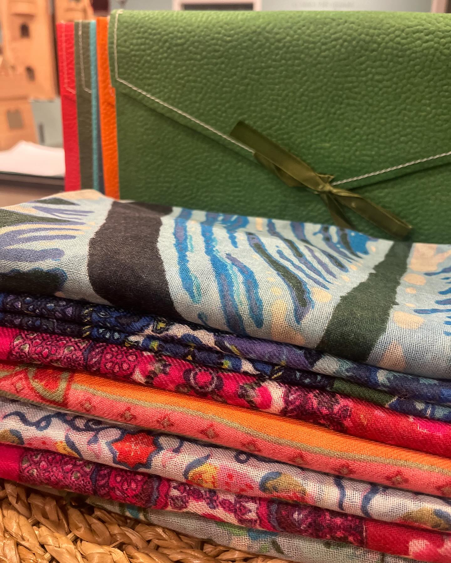 Bernadette’s favorite things in The Nest are the handprinted virgin wool scarves from France. They come in so many vibrant patterns and each have their own giftable sleeve to present them in.
Another of Bernadette’s favorite things are the handmade parchment notebooks. They are ideal for journaling, sketching, or note-taking, these notebooks offer a unique and elegant writing experience.
And of course, Bernadette loves the Geometry towels, as we all do. The patterns are pretty, the towels are super absorbent and dry super fast!