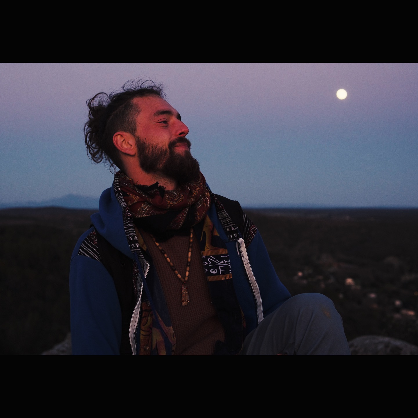 Self is the culmination of collective
Tens of thousands of years old, counting
Love is made, by and for every part of it
Every elemental infinite
Even if we must ever form defences
No matter the moments when we fall again, all
When we fall, despite all compasses of healings, indelible growths
It makes no waste of these progresses made.
We praise and we protect this space, like the culture
We innovate, woman and man:
This womb that gives life unto life
This entirety of creation’s strength and virtue.
Our kindnesses are visceral,
the sincerity will never be burnt by the heat of frenetic
digi-suns of a meta
Those that coal-seam-gas light the age of the artificial.
We are all sun
Letting bygones be gone, father
His eyes will shine-on even in the hearts and eyes of
all-world storms, and verses,
son.
She is lumineer and a dawn of moon’s, she
Is Illumination of sun also,
not but mere Reflection,
Say One
The child that shall become of all legacies
The ones where we make many differences
thanks to our standings and the honing of our choices.
Say One, know
No matter the messes they made and still veneer
Say One
Say Ready.
(Excerpt from a recent piece ‘Say One’)
Many thanks to @ppprecious.zimmermann of @nightvisions.films.and.reports for these full moon at sunset photos taken in the place on Earth most dear to me. The mountain top of Mont Aigue in Southern France, a place we call ‘La Madonne’ after the statue of Mary there that looks protectively down over the village I was raised in.
We were filming the penultimate scene of SOLACE, The Film, the art film | music video for my songs Wild|Wise and SOLACE, which we’ll be releasing in March.