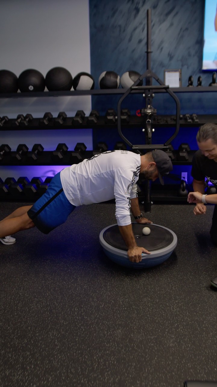 💪 Tall Plank on Bosu Ball: Core & Shoulder Stability 💪
This exercise is perfect for dynamic core and shoulder stabilization, especially for those recovering from shoulder injuries. By using the Bosu ball, we’re adding an unstable surface that enhances shoulder activation and challenges your core, all while supporting your full-body functional training goals.
If you’re battling a shoulder injury or just want to strengthen your foundation, this is the move for you! Book your session today and let us help you strengthen and stabilize.
👉 Call us or visit OPCMED.com to schedule your session.
#OptimumPerformanceCenter