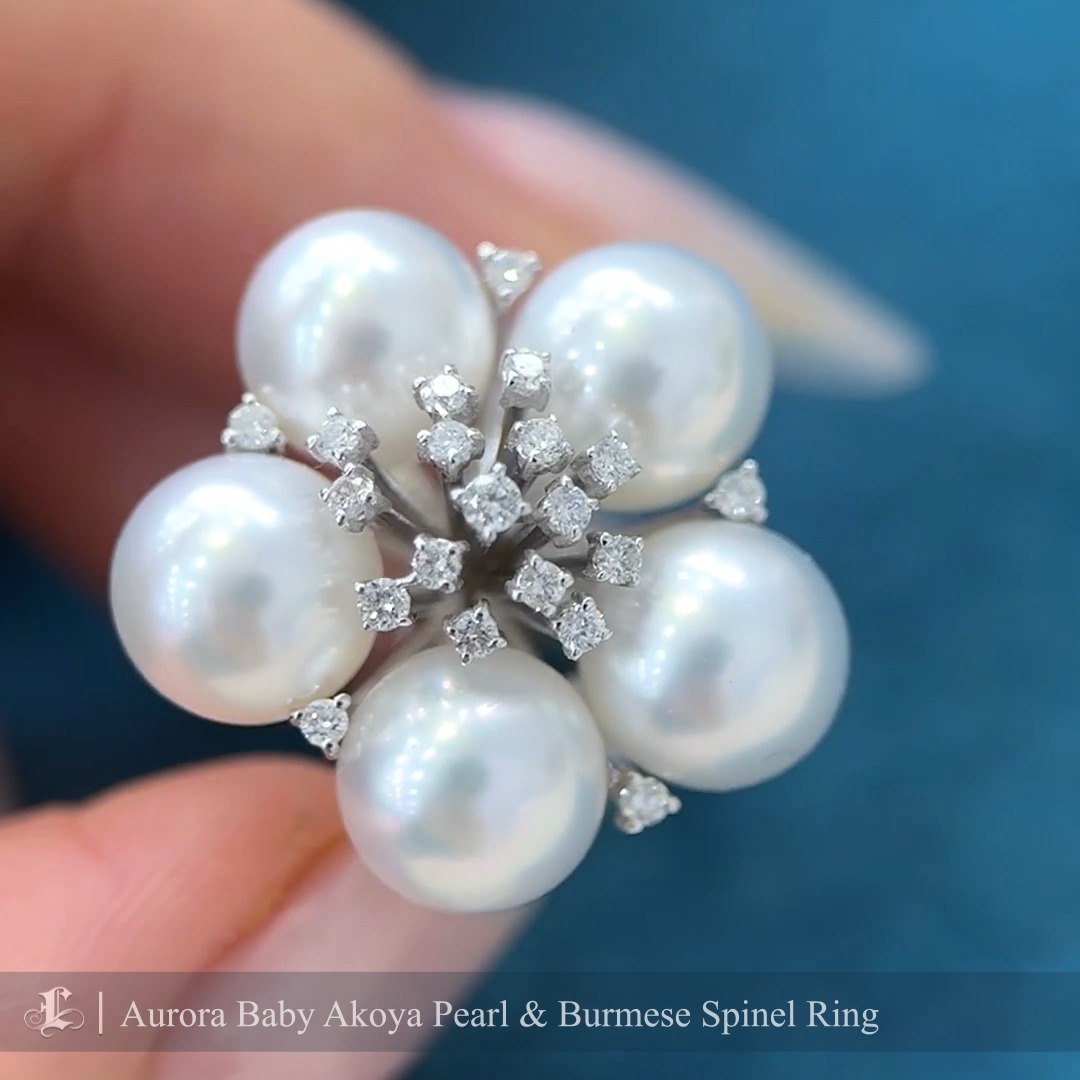 This striking ring features Aurora Akoya pearls of exceptional luster arranged in an elegant floral-inspired cluster. The radiant pearls are accentuated by sparkling diamond details, creating a dazzling centerpiece that embodies luxury and sophistication. Crafted in 18K white gold, this statement ring is perfect for those seeking a bold yet timeless accessory, ideal for special occasions or adds glamour to everyday wear.
#akoyapearljewelry #akoyapearlring