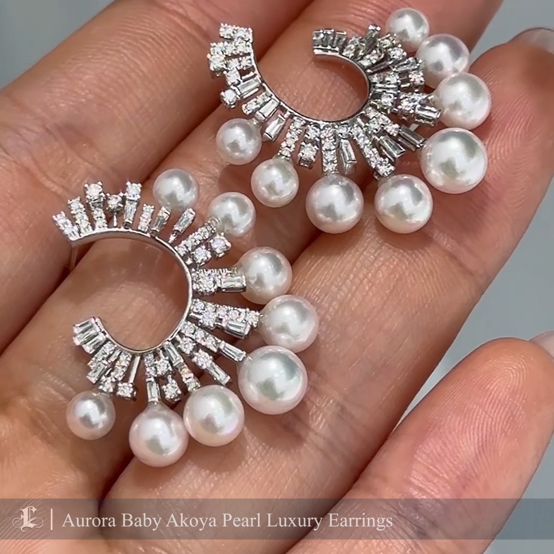 Crafted with perfectly round Aurora Baby Akoya pearls, these exquisite earrings embody both sophistication and modern elegance. The delicate size and radiant luster of Baby Akoya pearls have grown increasingly popular in recent years, making them a favorite for luxurious yet understated jewelry designs. Set in a dazzling crescent adorned with brilliant and baguette diamonds, these earrings strike the perfect balance between luxury and refined charm. Ideal for those who seek timeless beauty with a touch of graceful glamour.
#japaneseakoyapearl
#japaneseakoyapearlearrings