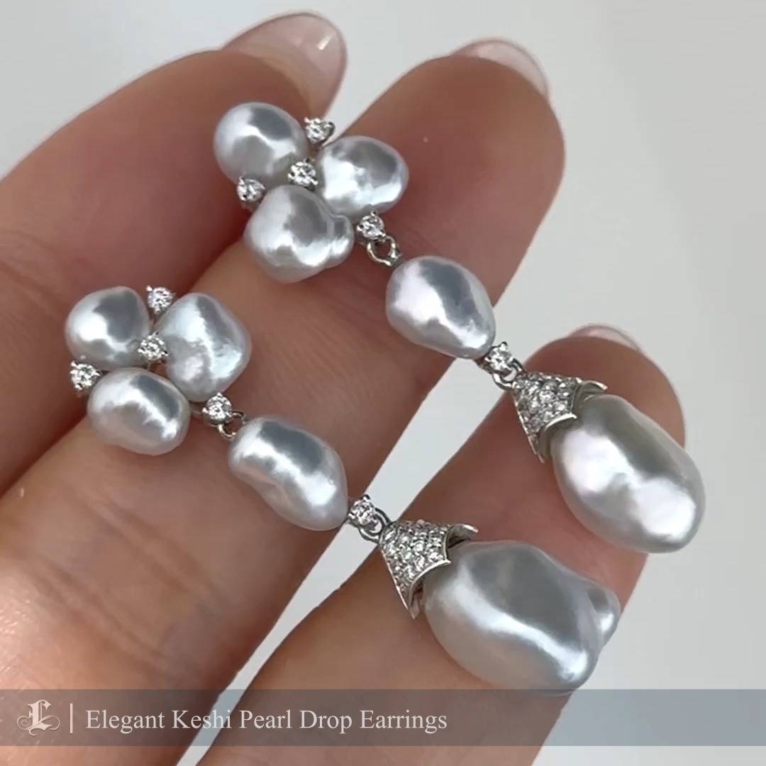Crafted with luminous Keshi pearls, these exquisite earrings exude sophistication and natural beauty. Each pearl showcases its unique, organic shape, highlighting the individuality of this rare and highly sought-after material. The design is accentuated with sparkling pavé-set diamonds, adding a touch of timeless glamour. Perfect for special occasions or elevating your everyday style, these earrings are a testament to refined craftsmanship and elegance.
#keshipearlearrings #keshipearljewellery