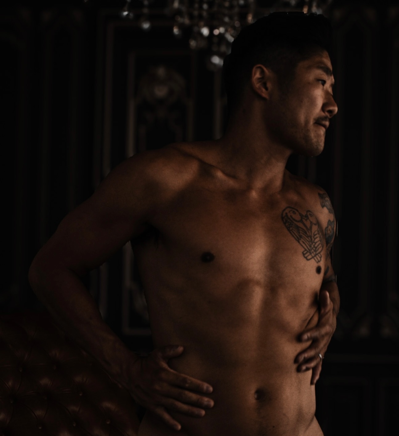 Every inch of his body is sculpted to perfection, the smooth contours of his physique a tantalizing promise of what lies beneath the surface of desire.