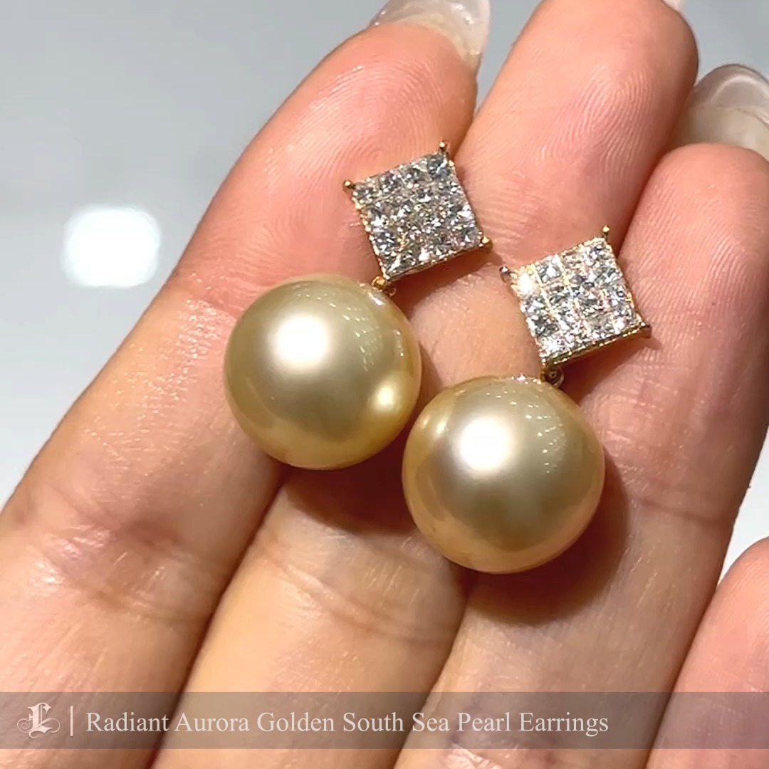 These elegant earrings feature lustrous Aurora South Sea golden pearls, renowned for their radiant sheen, rich golden hue, and flawless surface. The pearls are perfectly complemented by dazzling square pavé diamond tops, adding a touch of modern sophistication and sparkle. Set in luxurious yellow gold, these earrings exude timeless elegance, making them an ideal choice for formal occasions or as a statement piece for everyday glamour. Their exquisite craftsmanship and luminous design make them a cherished addition to any fine jewelry collection.
#goldensouthseapearlearrings #goldensouthseapearljewelry