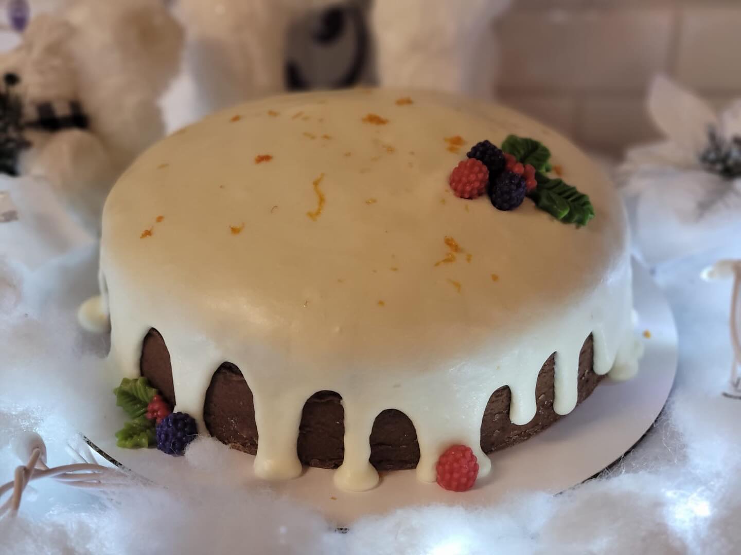 This sherry wine cake is the perfect dessert to bring to holiday celebrations. With candied fruits, orange glaze, and marzipan decorations, it makes for a light, refreshing treat that the whole family will love!