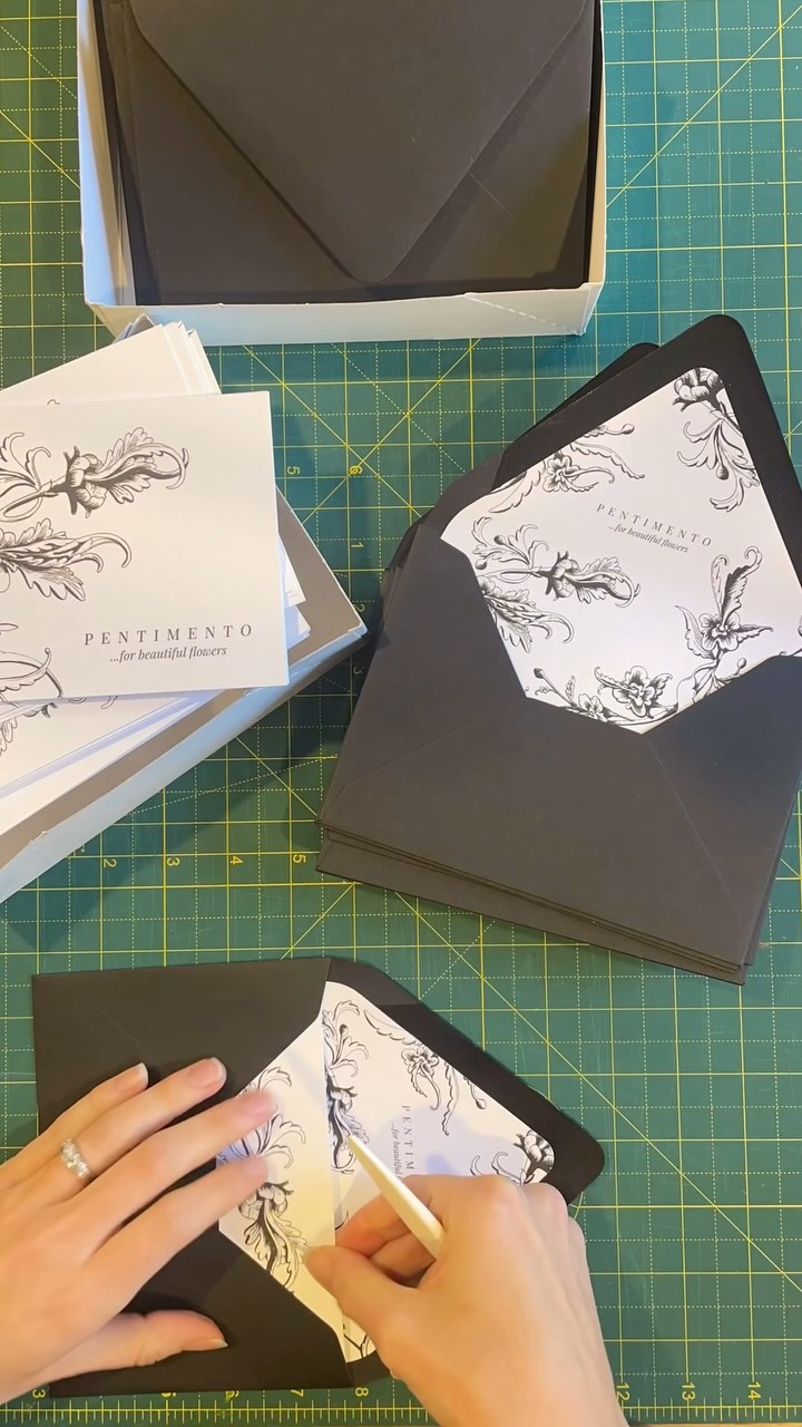 These envelopes don’t stuff themselves… three papercuts and counting!! ✉️
Grateful for this little bone fold saving my hands this week, as I’ve assembled two full sets of wedding invites, and finished 300 of these beautiful little black and white notecards for flower deliveries @pentimentodesign
#occupationalhazard #weddingstationery #floristshop #notecards #envelopeliner #papergoods #weddinginvites #assembly