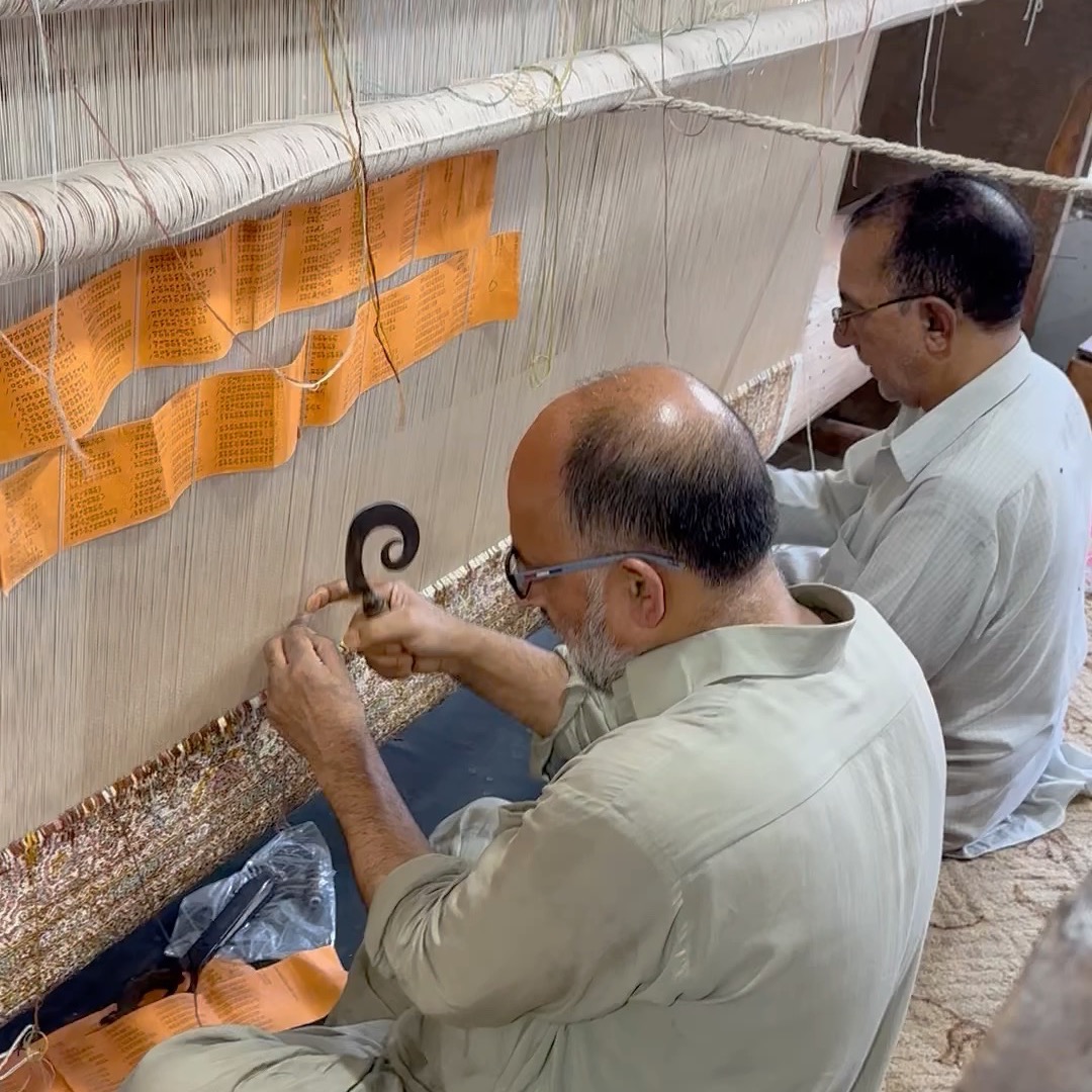 The art of knotting Kashmiri rugs.