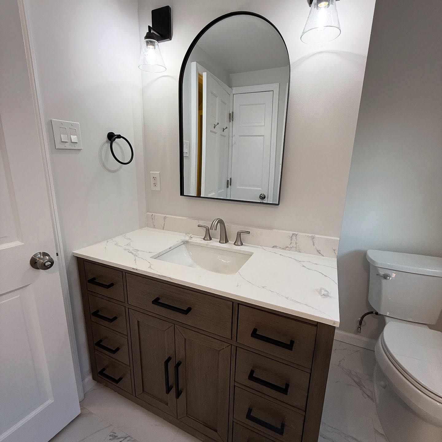 Full bathroom renovation 12x24 FND tiles, Delta fixtures, exotic Vanity all work done by @aceremodelingnj