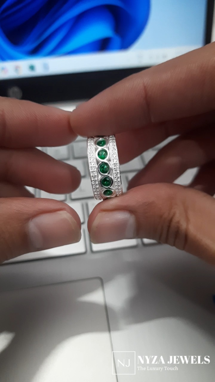 "When love is as rare and precious as an emerald wedding band~Nyza Jewels." 💚💖 #PricelessLove #EmeraldWedding #RareGem