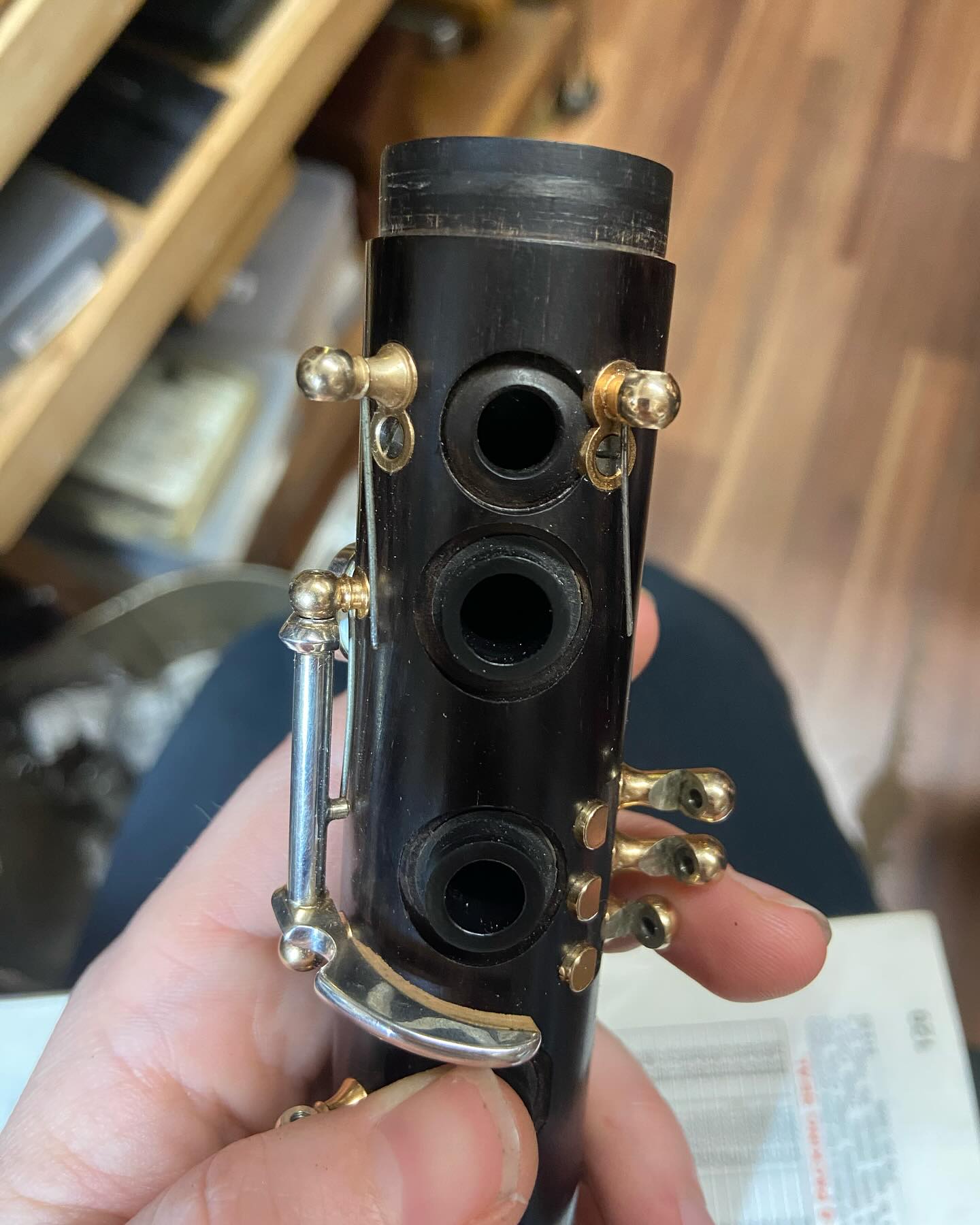 This clarinet cracked due to a loose ring, so I re-enforced underneath the ring with a carbon fiber band before refitting the ring