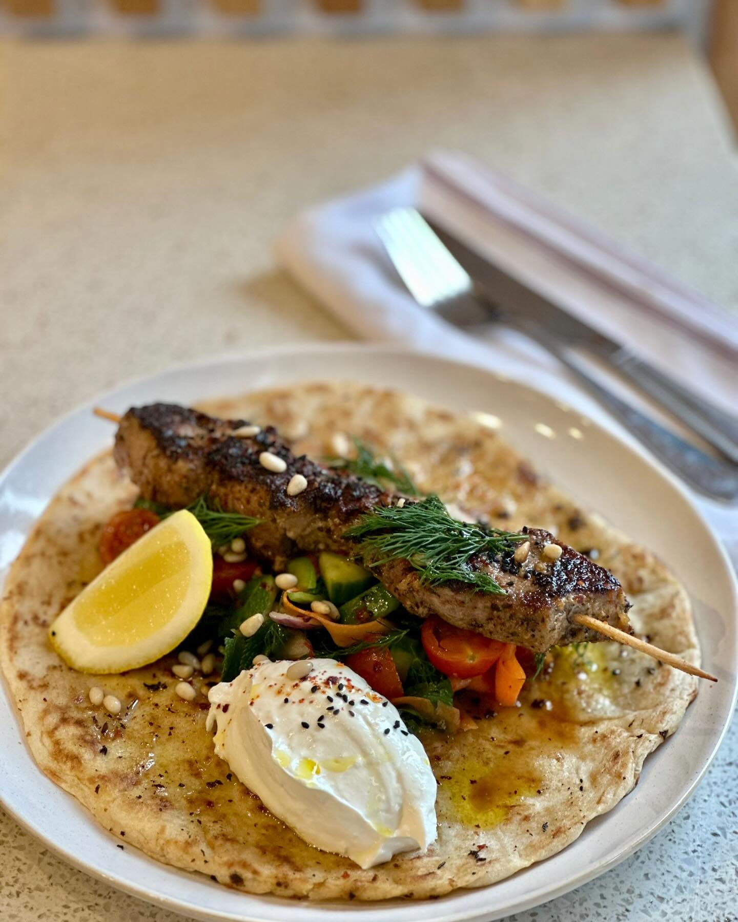 Pork neck souvlaki on for lunch.