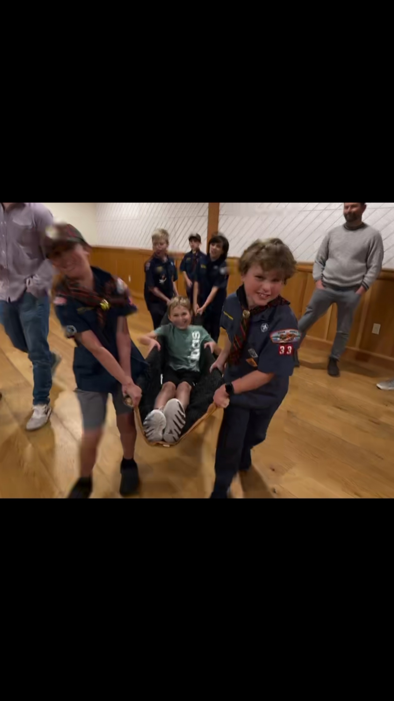 Reason #1,654 to have your child in Scouts - wilderness survival. Last night Erik taught the kids to create makeshift stretchers to help injured friends out of the woods. Lots of trees in these parts! Might come in handy someday! 🌲🌲🌲🌲