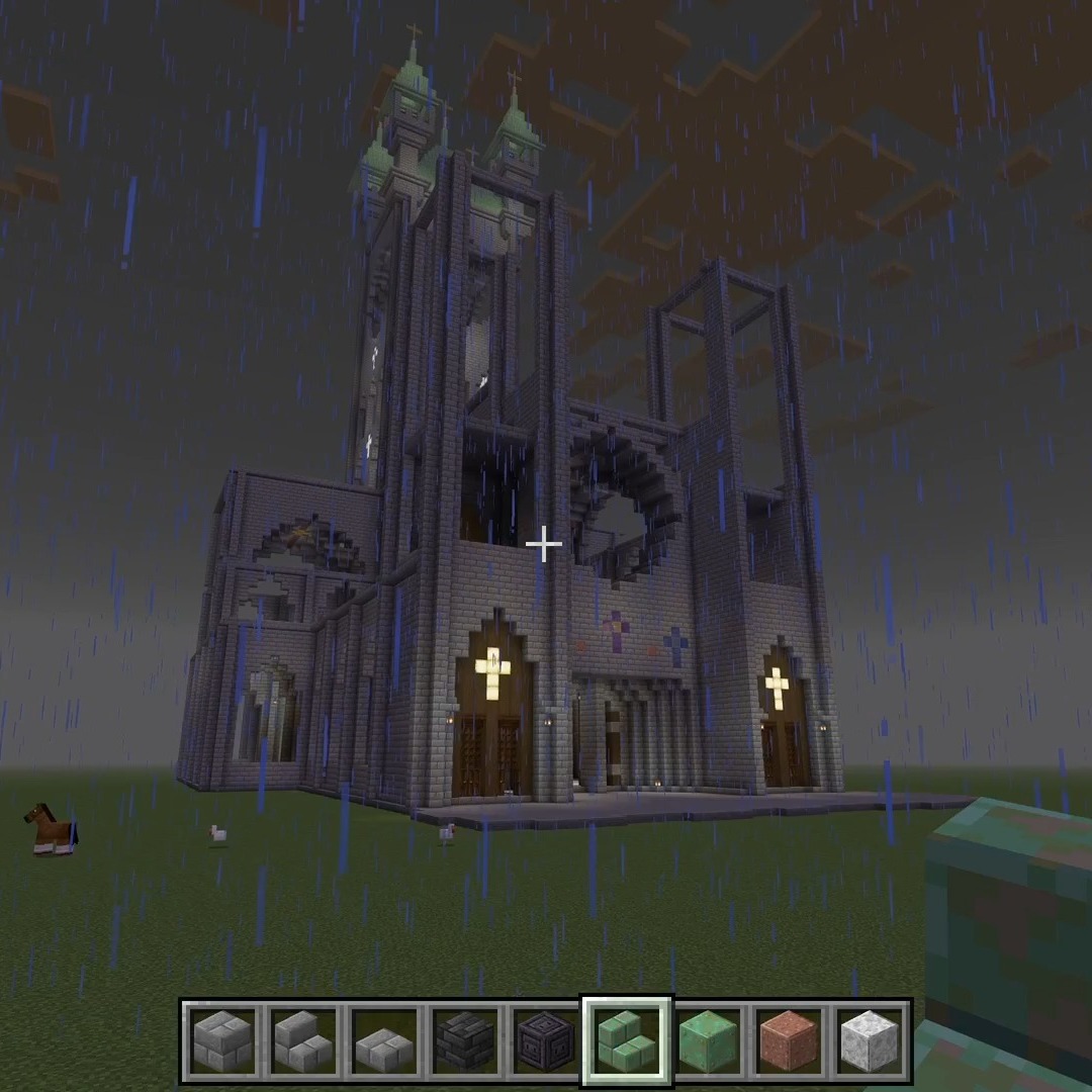 This is the last one for today. I put in roofs on the left and right side aisles. I also started putting in access ways to get to the various towers so that if you were playing in survival you can actually access all parts of the building. One interesting part of this process is that as I thought about gaining access to the towers it forced me to add some structure on the lower parts of the top turrets. This addition actually made the turrets look a lot more realistic.