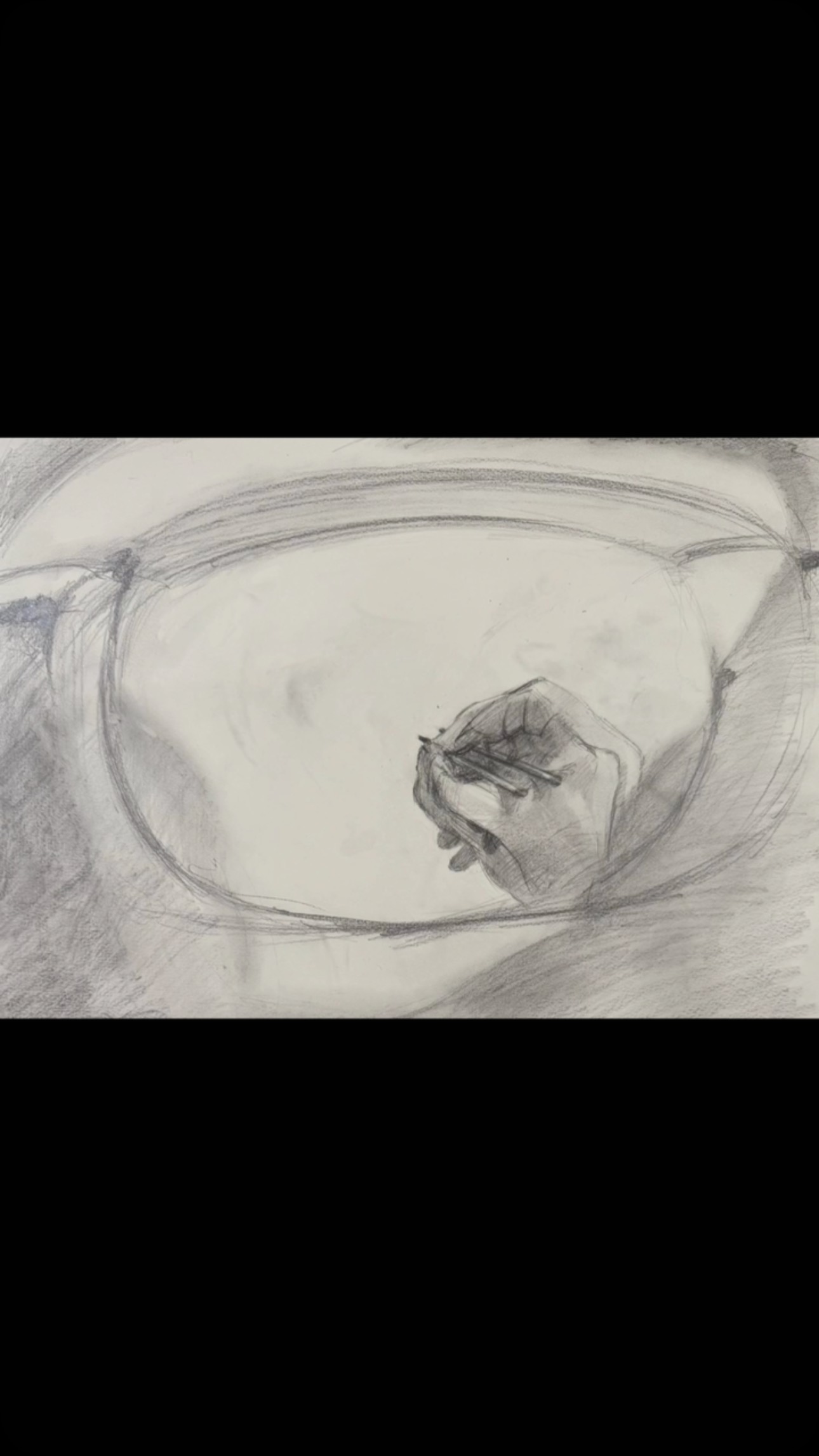 Experimental drawing of me looking at my hands with both eyes.