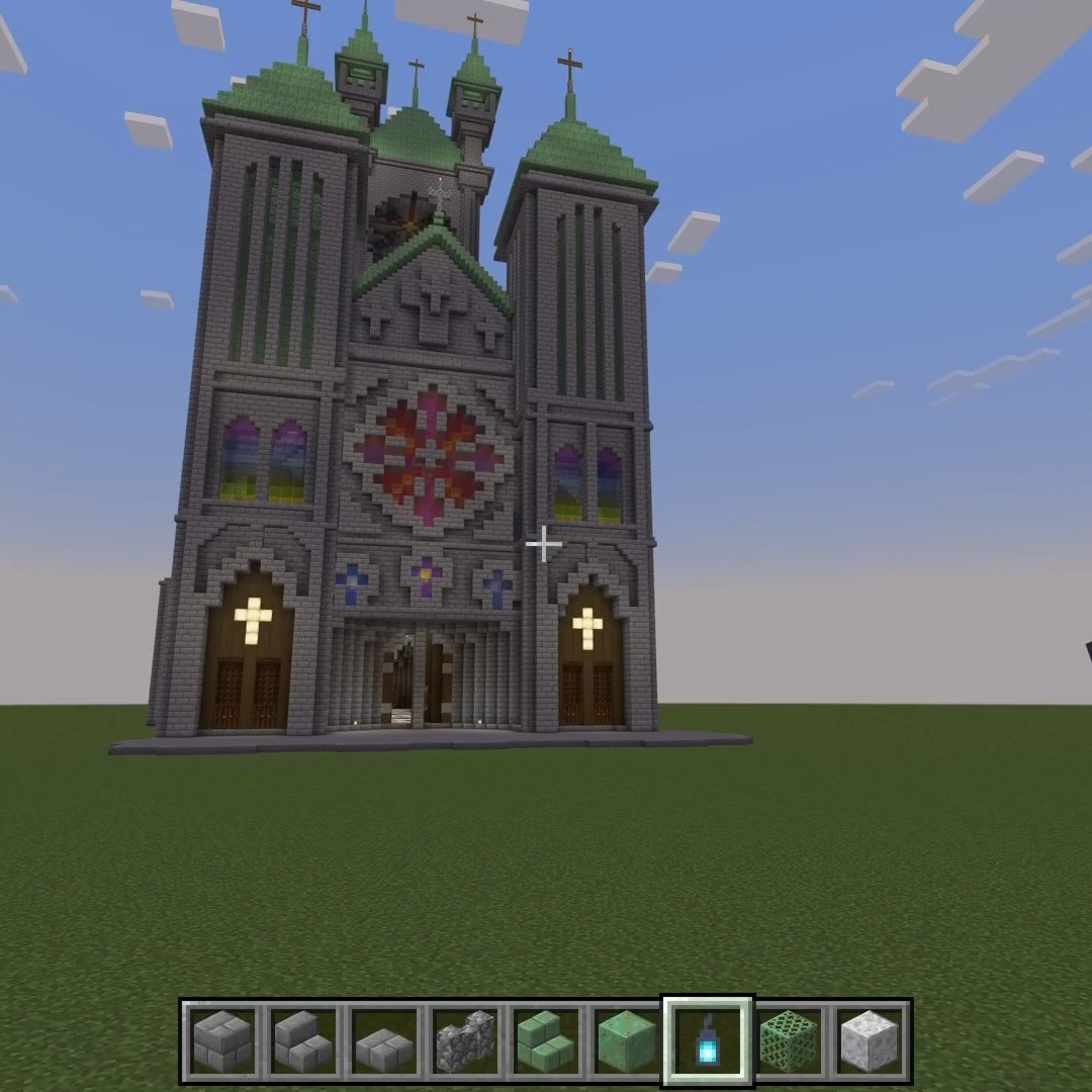 Still working on the Cathedral. Finished the front facade and added a roof to the nave. Also built another "rose" window and designed and installed a third, though the final details on that one still need to be completed.