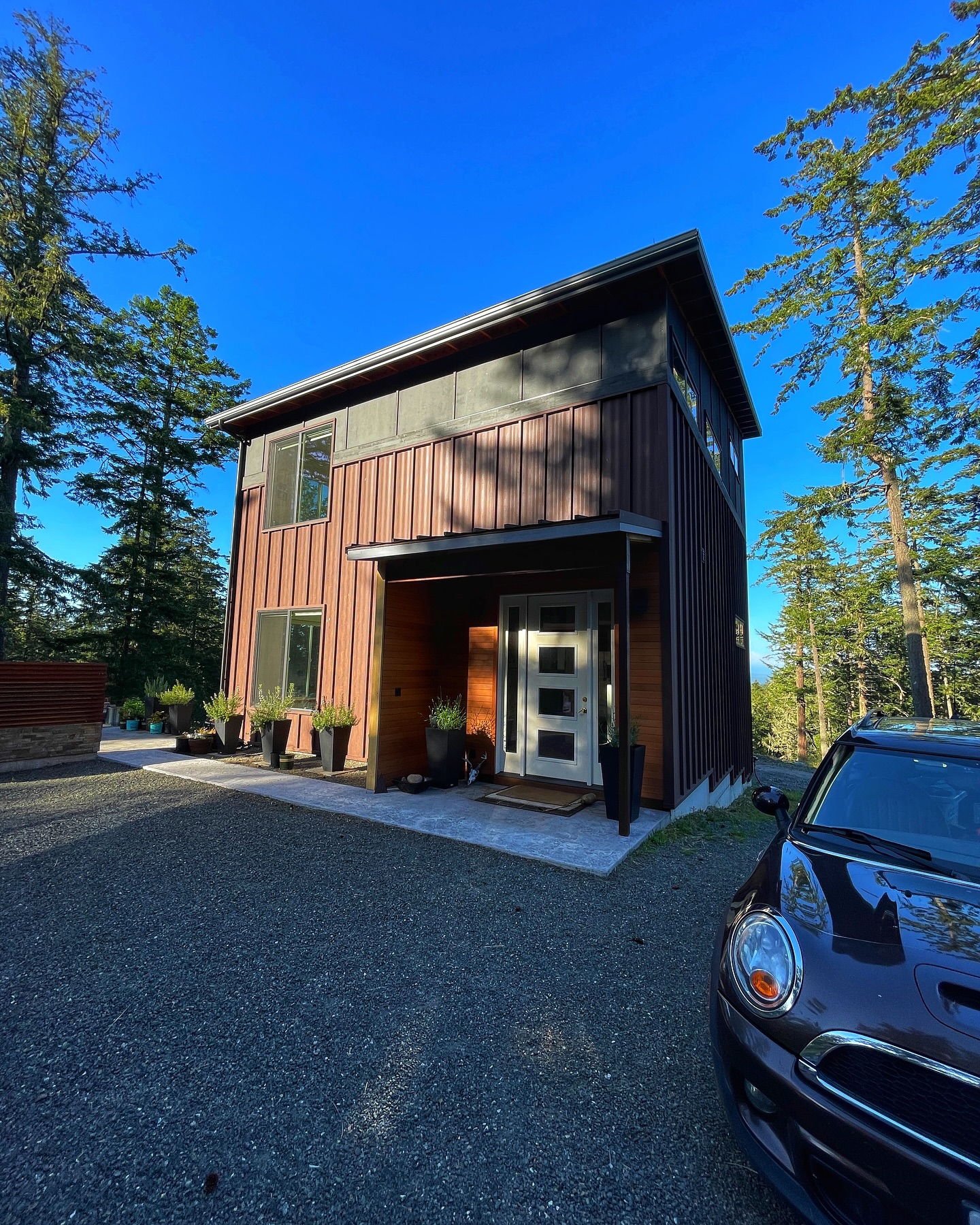 Contemporary Home 1700 sf ready for Entertaining. Exterior metal siding and roof has aesthetic appeal as well as reduced maintenance#contemporaryhome #custom #metalsiding #metalroofing #pacificnorthwest #pnwarchitecture #sanjuanislands #washington