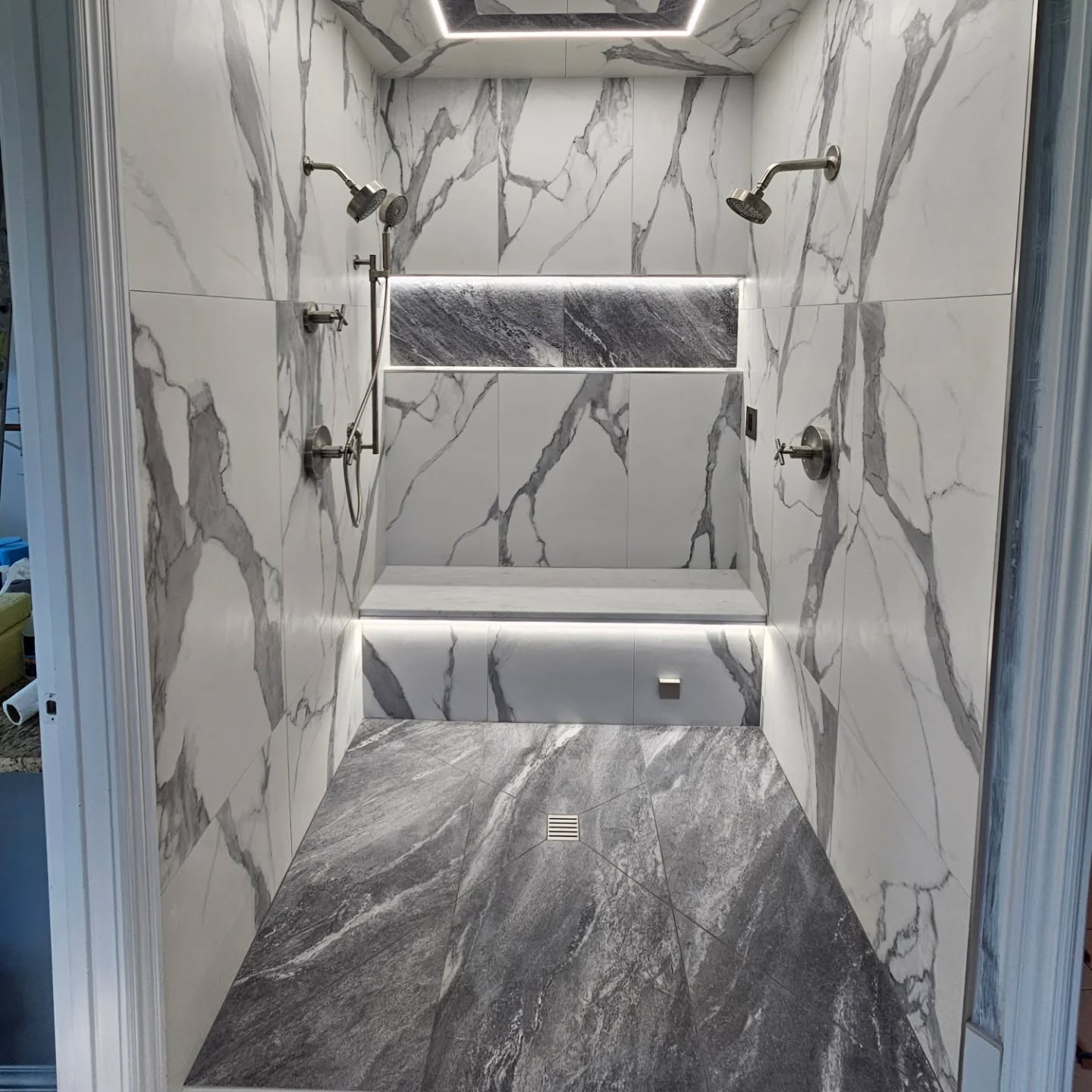 Part 2... Finished product.
2'x4' tile on walls and shower floor
.
.
.
.
#tile #tiles #masterbathroom #design #designer #realestate #shower #custom #flawlessfloorskc