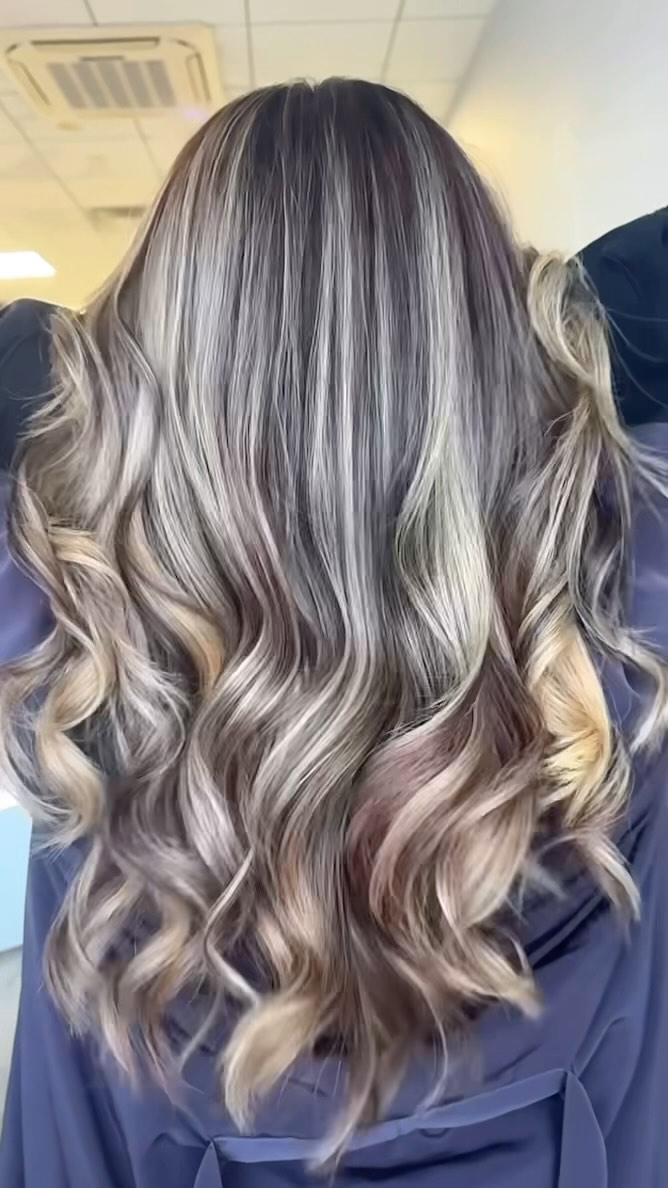 Balayage, haircut & style to start the year off right! Call us to schedule your hair appointment at 718-796-3939.