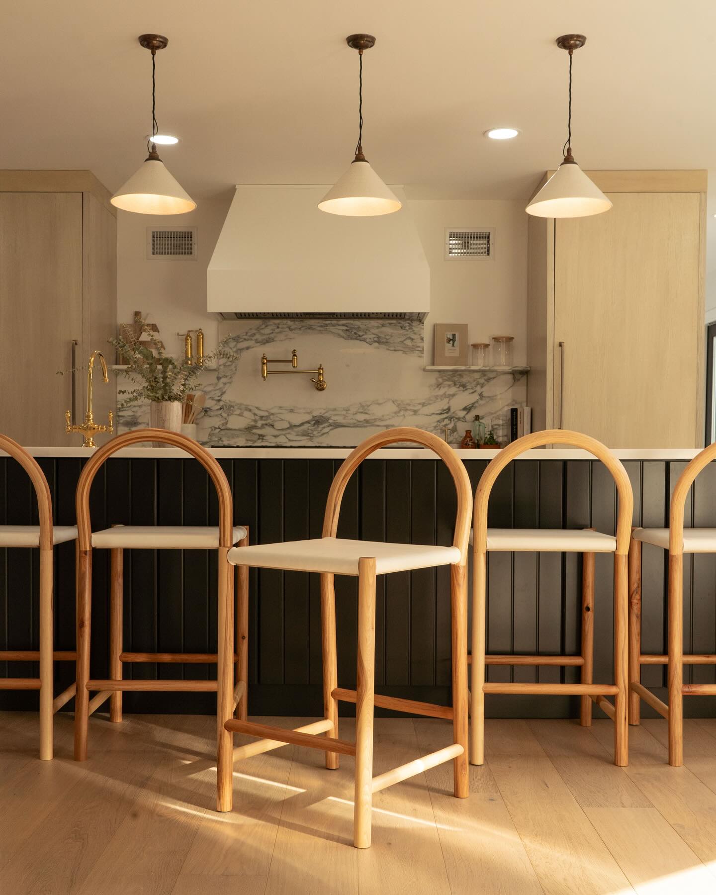 Every now and then, we take on a project that pushes us creatively and challenges us to think differently. This was certainly one of those jobs.
Getting outside of our comfort zone and trying something new is one of the most rewarding parts of woodworking.
For this project, Brandon and I had to learn how to steam bend wood. We worked with Hickory Heartwood for the first time to give these stools warm tones and tons of contrast. We made a router table to make dowels, and upholstered white faux leather seats.
All in all, this will be a project we remember! 🪵🛠️✨
#pathdesign #pathdesignco #followyourpath #woodworking #customwoodworking #furniture #hardwoodfurniture #realamericanhardwood #customfurniture #kitchenislandstools #archedstools #hickoryheartwood