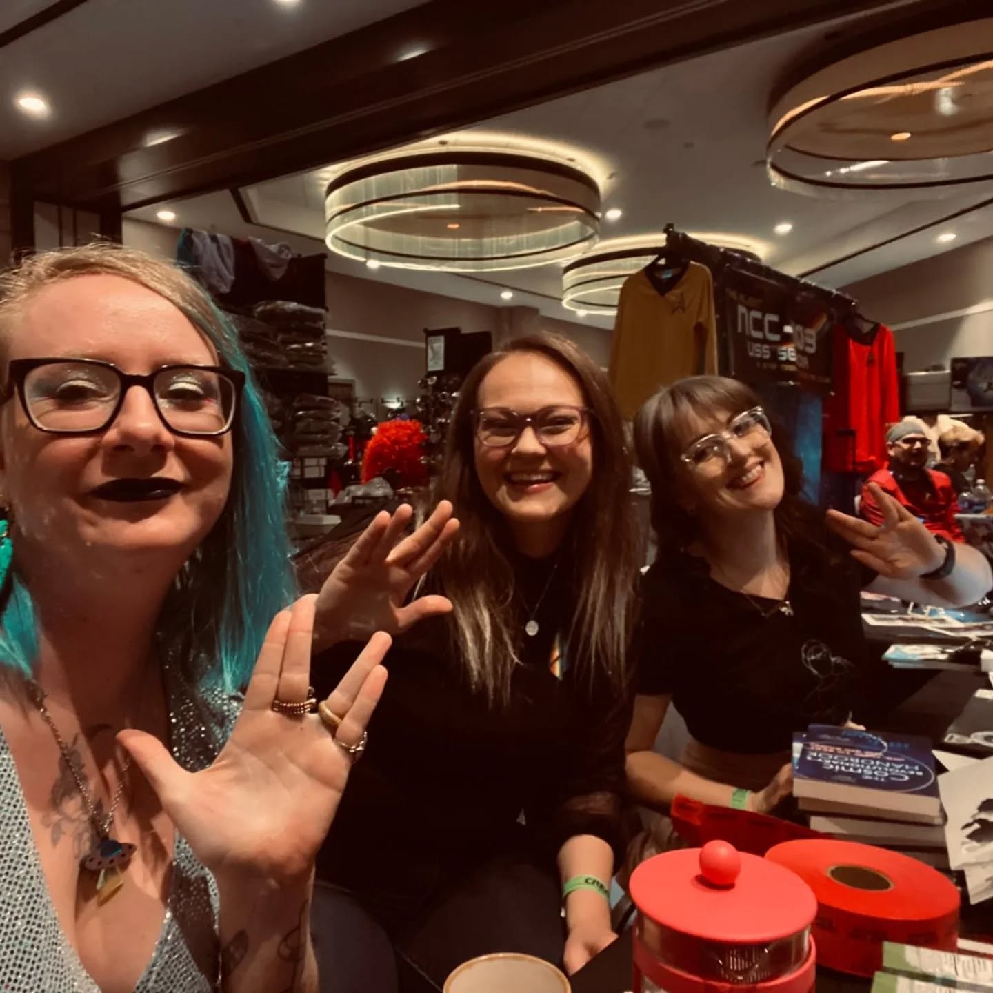 The amazing ladies of TNI, Seven, Liv, and Jess celebrating at the swag table after a successful panel today! 🖖🤓
If you're around come say hey!
#stsfo #startrek #scifi #neurodiversity
#spacescience #ndinstem