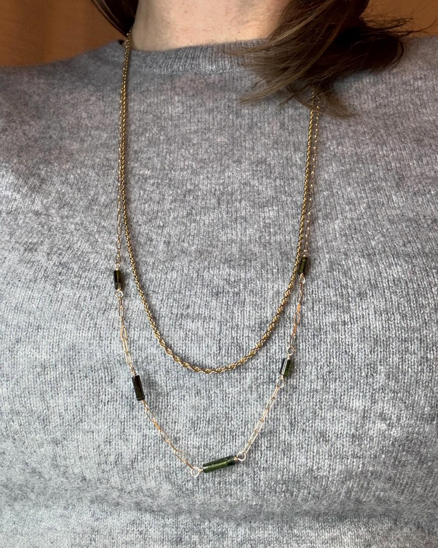 Finally back in the studio after hibernating. These tubular tourmaline beads have me feeling inspired by the piece in the 2nd image. After starting, I thought maybe I should abandon it in favor of a strung piece, like the one in image 3. Keep going with the inspired piece, or abandon it for what feels like tourmaline Morse code? CLICK VOTE below and let me know! #handmade #tourmalinejewelry #madeinmilwaukee