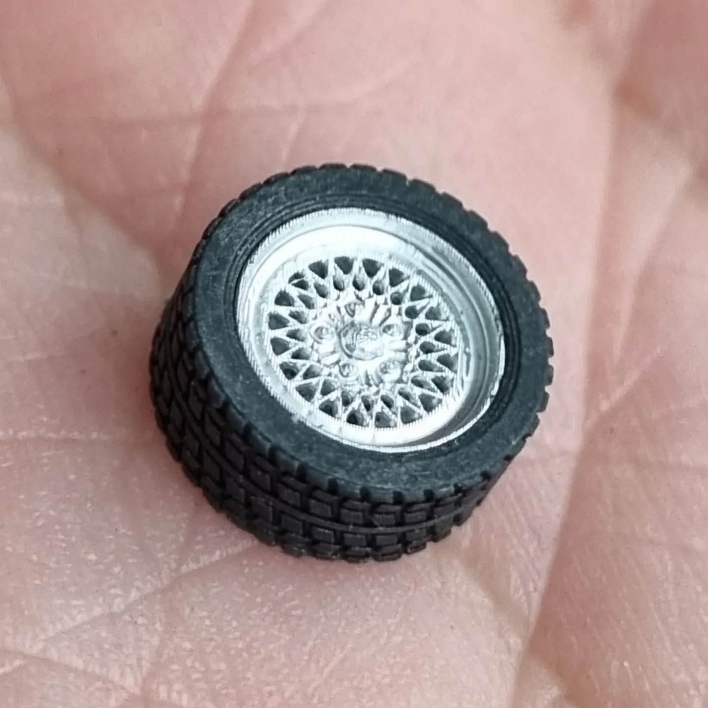 90% there. This is our first wheel & tyre unit. The rubber is soft and grippy and features a visible tread pattern. It also has a groove inside that helps it fit tightly to the highly detailed, chrome painted rim. The axle head doesn't go through the rim, allowing for a far more authentic wheel finish. Can you guess the car this will be fitted to?
It will be our first release, code-named P0001.
#164scale
#164diecast
#scalemodel
#modelcar
#rubber
#diecastproduction