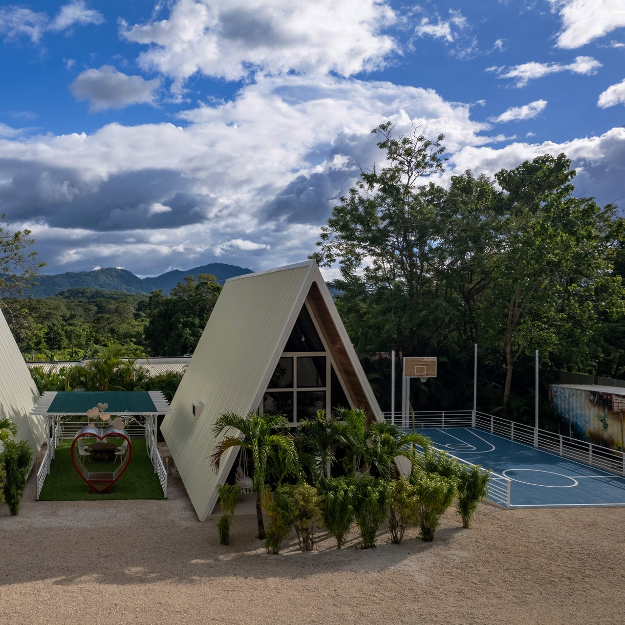 Escape to The Toucan Casa, a charming modern A-frame villa located in Potrero, Guanacaste, Costa Rica. Surrounded by lush greenery, this villa offers the perfect blend of comfort and style, making it the ideal retreat for families. Inside, you’ll find a cozy, contemporary interior with a fully equipped kitchen that’s perfect for preparing meals. The spacious dining table is perfect for family gatherings, while the view of the tranquil garden adds a peaceful ambiance. Whether you're looking to relax or explore, The Toucan Casa is the perfect home base for creating unforgettable memories. DM us now to book your stay!
#TheToucanCasa #PotreroGuanacaste #CostaRicaGetaway #FamilyRetreat #TropicalVilla #DreamVacation #BlueRidgeCostaRica