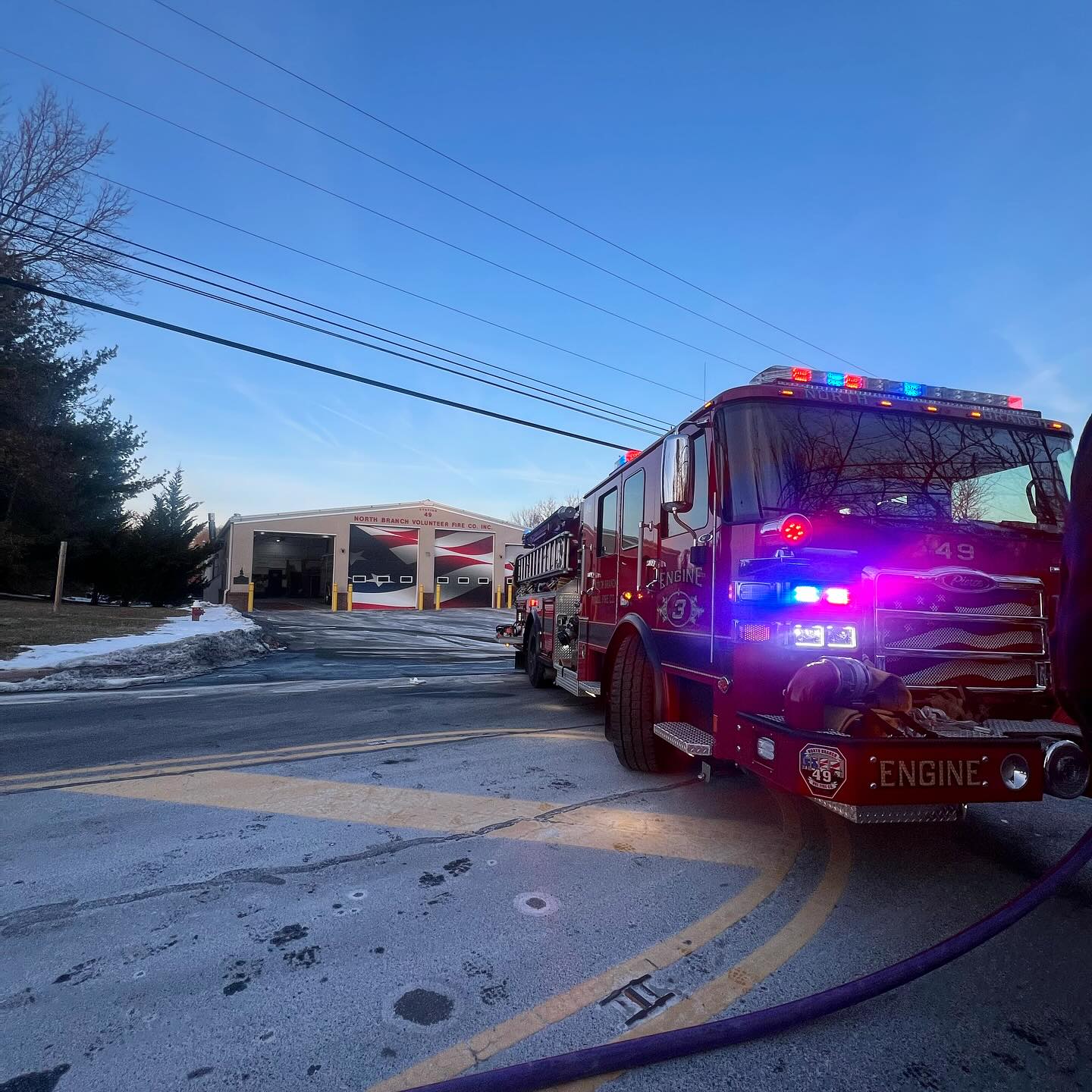 Sometimes we have to drive to the fire, other times they end up right in-front of the firehouse!
Earlier today we were alerted for a vehicle fire on Route 28 in Branchburg. The volunteers at the firehouse opened the bay door for Engine 3 and found an SUV with fire coming from the engine compartment right outside. The short drive out of the firehouse, and quick deployment of the bumper line made easy work of the fire.