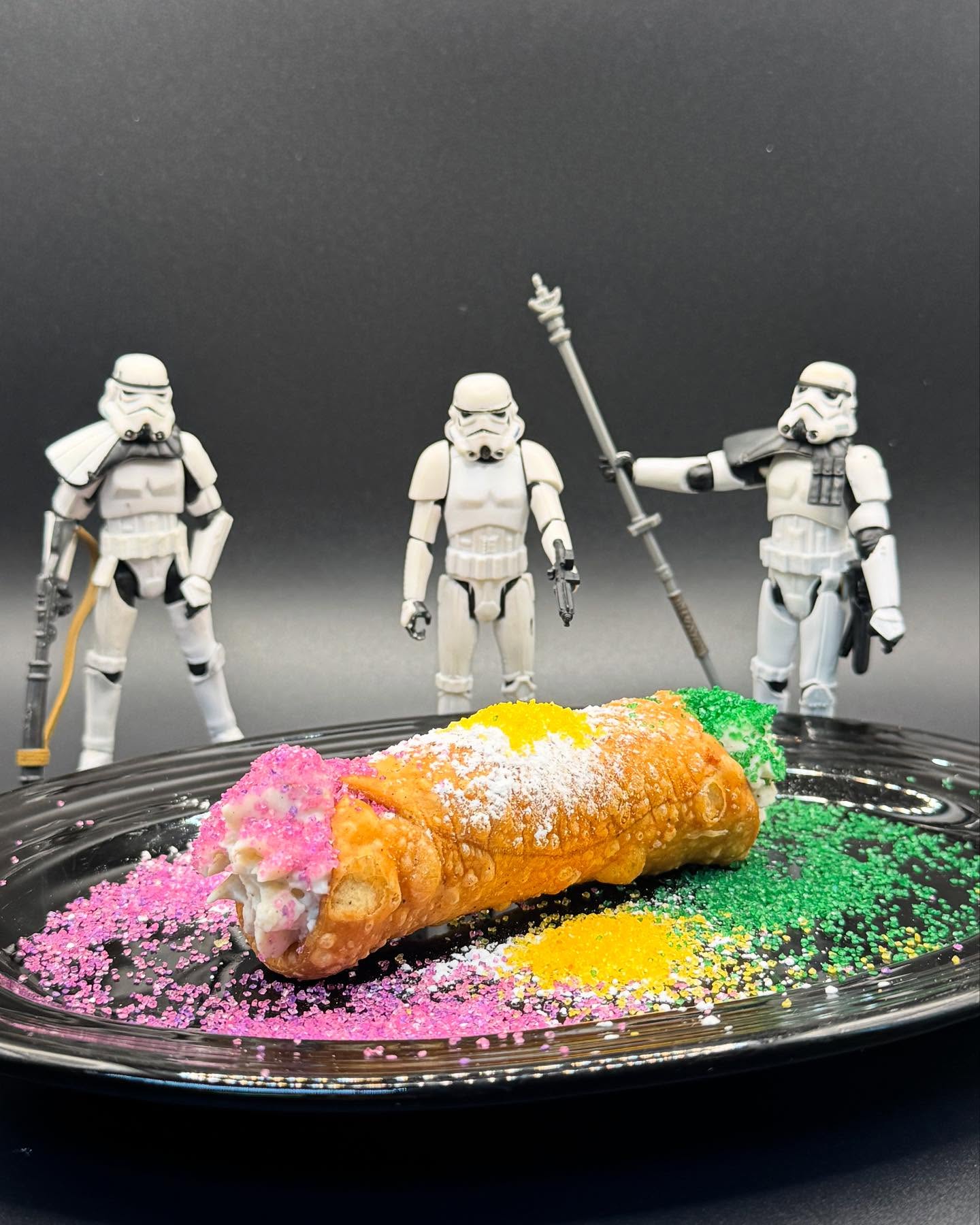 Don’t just stand there! Come get you some! King cake cannoli with delicious cream cheese filling and a crunchy cinnamon cookie. It’s the stuff dreams are made of. #cannoli #kingcake #bestinthegalaxy