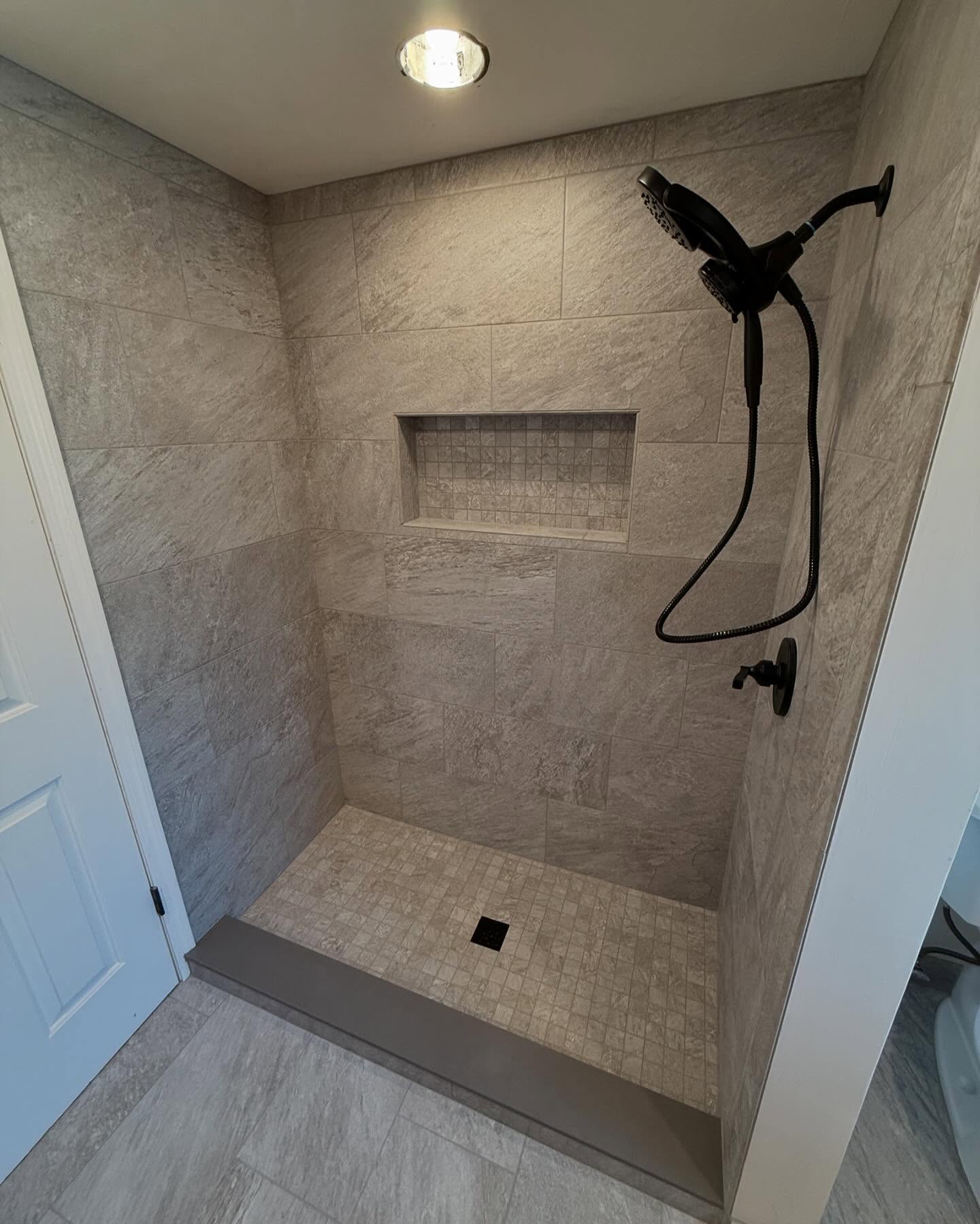 Shower remodel for a friend of ours. Get yours today by visiting us online.
#bathroom #remodel #tile #subwaytile #largeformattile #largeformat #schluter #geneseeceramictile