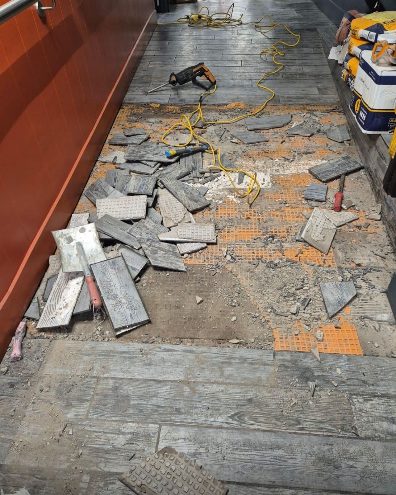 Love Fish in Leysdown-on-Sea set us the task of uplifting their failed ceramic tiles, preparing subfloor with flooring grade plywood and latex screed before fitting Polysafe Wood FX sheet Vinyl flooring with joints thermally welded. Task complete and it looks amazing!