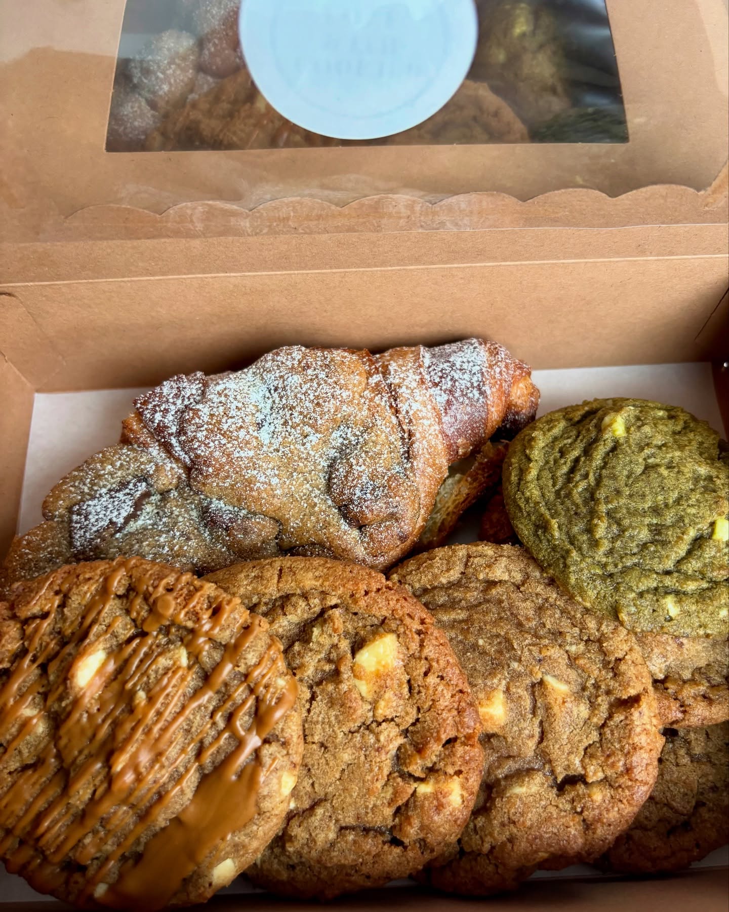 We made it through the first month of the year—if that’s not a reason to treat yourself to some cookies, we don’t know what is.
Swipe through the options to let us know your favourite POV and which flavour you’d want to kickstart your February!
1. Classic Chocolate Chunk – A timeless favourite 🍫🍪
2. Gingerbread & White Chocolate – Festive and cosy, all that Christmas nostalgia ❄️🎄
3. Biscoff & White Chocolate – Caramelised, creamy, and oh-so-addictive 🤎✨
4. Matcha – A little different, a lot delicious 🍵💚
5. Cookie Croissant – The best of both worlds, flaky meets chewy 🥐🍪
6. All of the above – Because why choose just one? 🙌🏾
Which one are you choosing? Comment below!