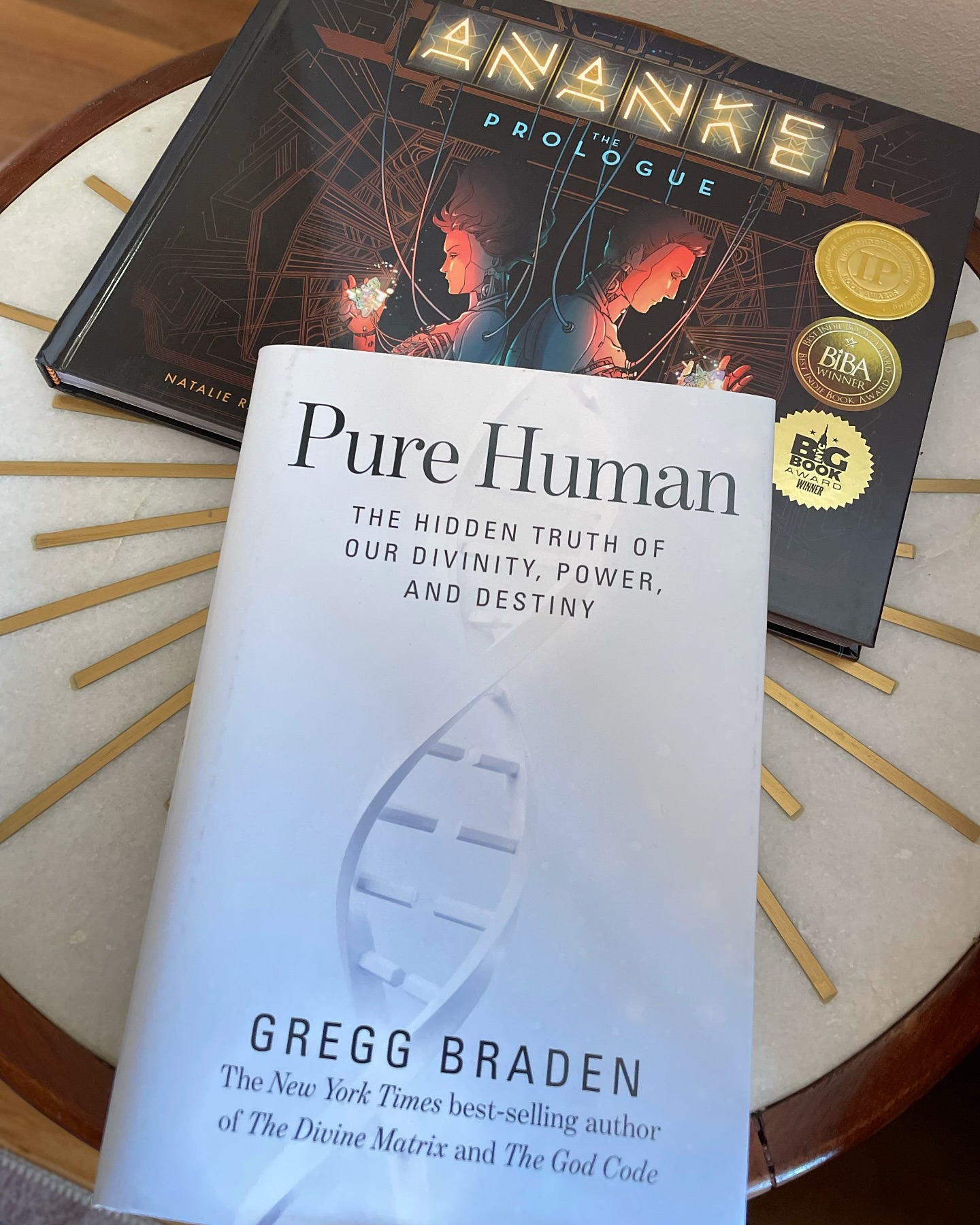 ✨Thrilled to dive into Gregg Braden’s new book, Pure Human! For nearly two decades, Braden’s work has inspired me, and like him, I find myself drawn to that eternal question: What does it mean to be human—especially in the age of emerging AI technology? It feels as though creative minds everywhere are tapping into this shared zeitgeist. I explore these ideas in my sci-fi graphic novel, ANANKE, pondering whether humanity will be lost in this digital revolution or if we are on the verge of uncovering an even deeper essence of who we are. I’m honored to be a fellow traveler with you on this shared quest to “know thyself.” ✨