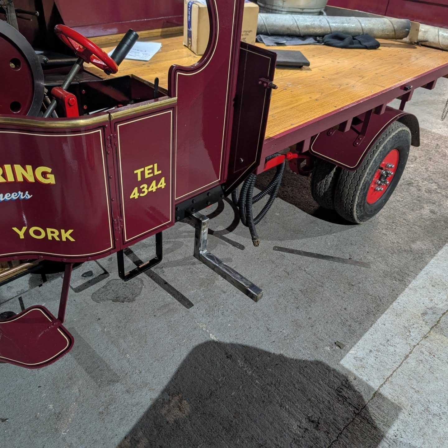 Always going the extra step for our customers.
With a fully equipped workshop we are happy to make modifications to engines to suit customers requirements. This step addition on the 4.5" Foden makes for a comfortable driving position with full access to the controls. It's also ideal when you have two people driving and the steersman needs somewhere to put their legs rather than just hanging over the sides.
When not required the step quickly pulls out and the mounting bracket is hidden under the cab so can't be seen. Last thing to do is give it a lick of paint and that's another job ticked off the list.